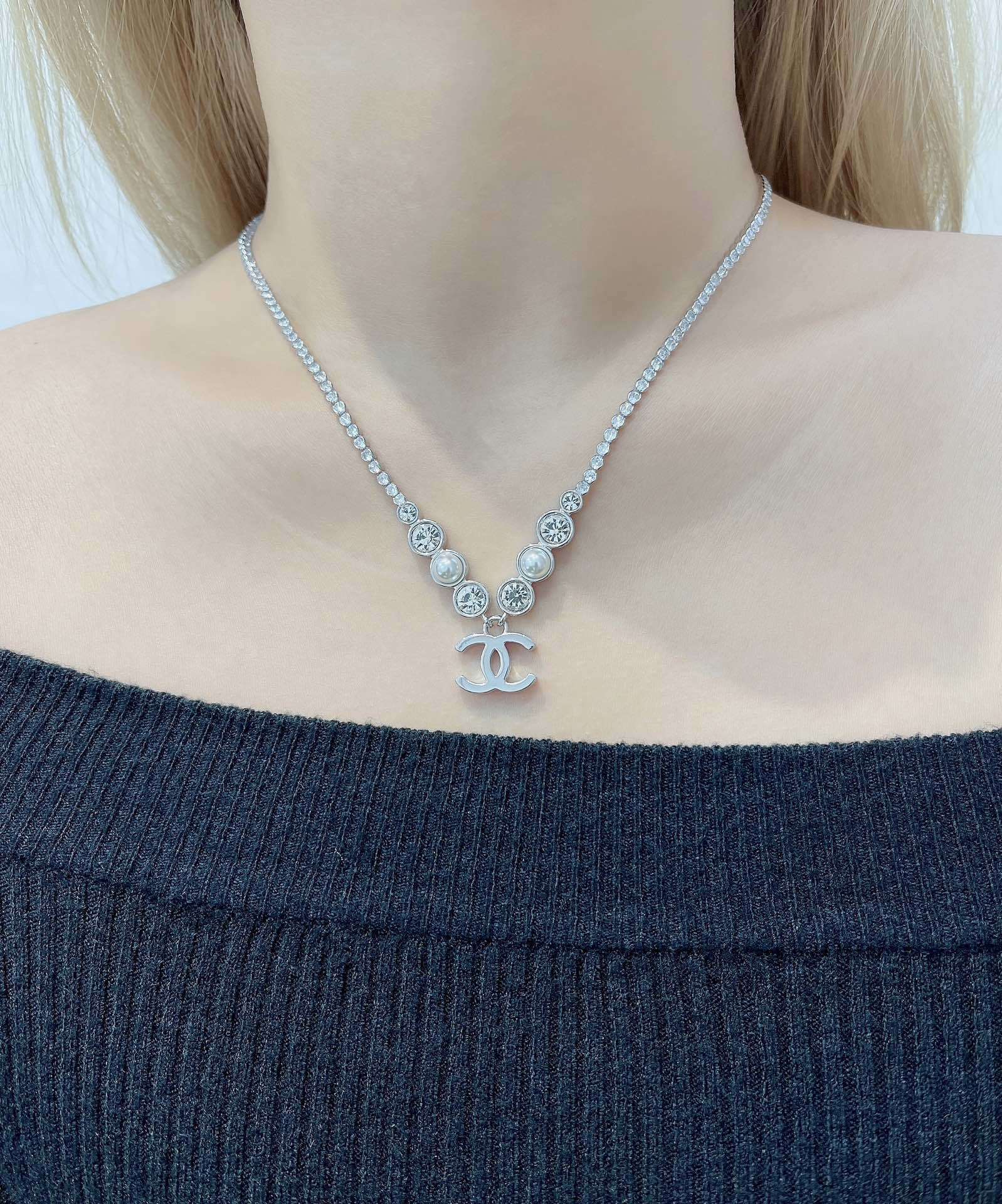 Chanel Silver Crystal CC Logo Necklace – Timeless Elegance