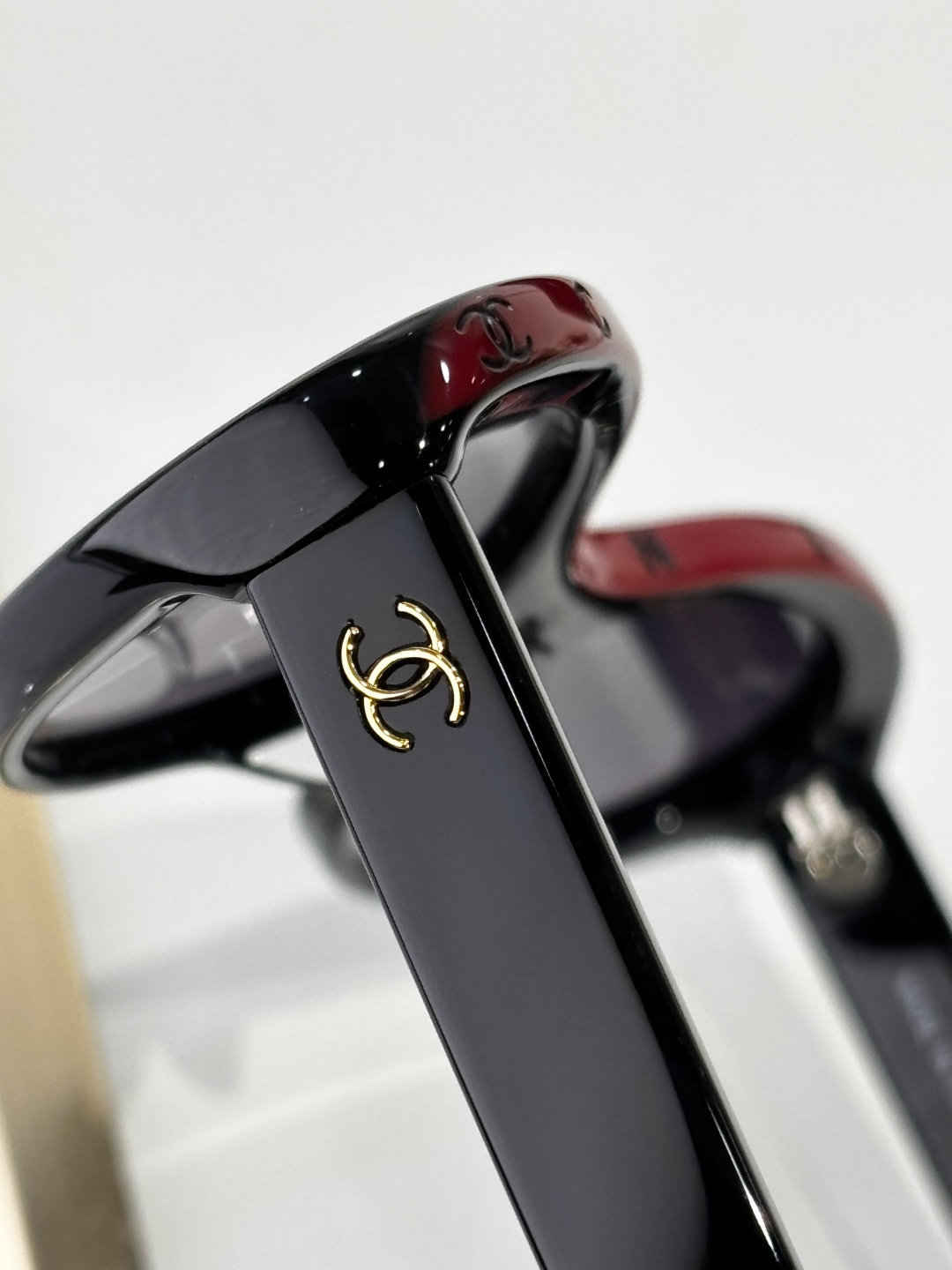 Chanel Oval Sunglasses in Black and Red Acetate Luxury Eyewear