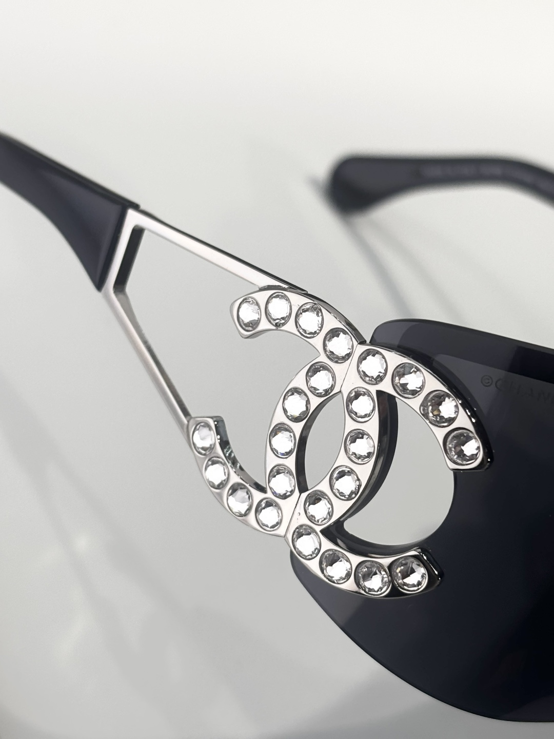Chanel Shield Sunglasses with Crystal CC Logo Rimless Design