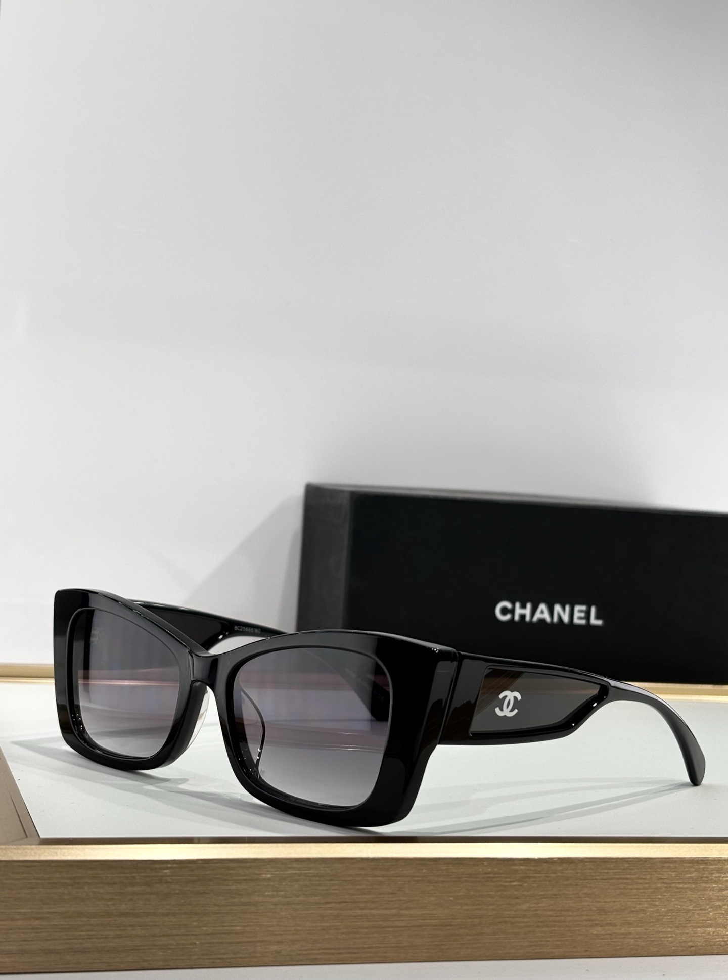 Chanel Luxury Butterfly Sunglasses – Elegant Black Frame & Tinted Lenses