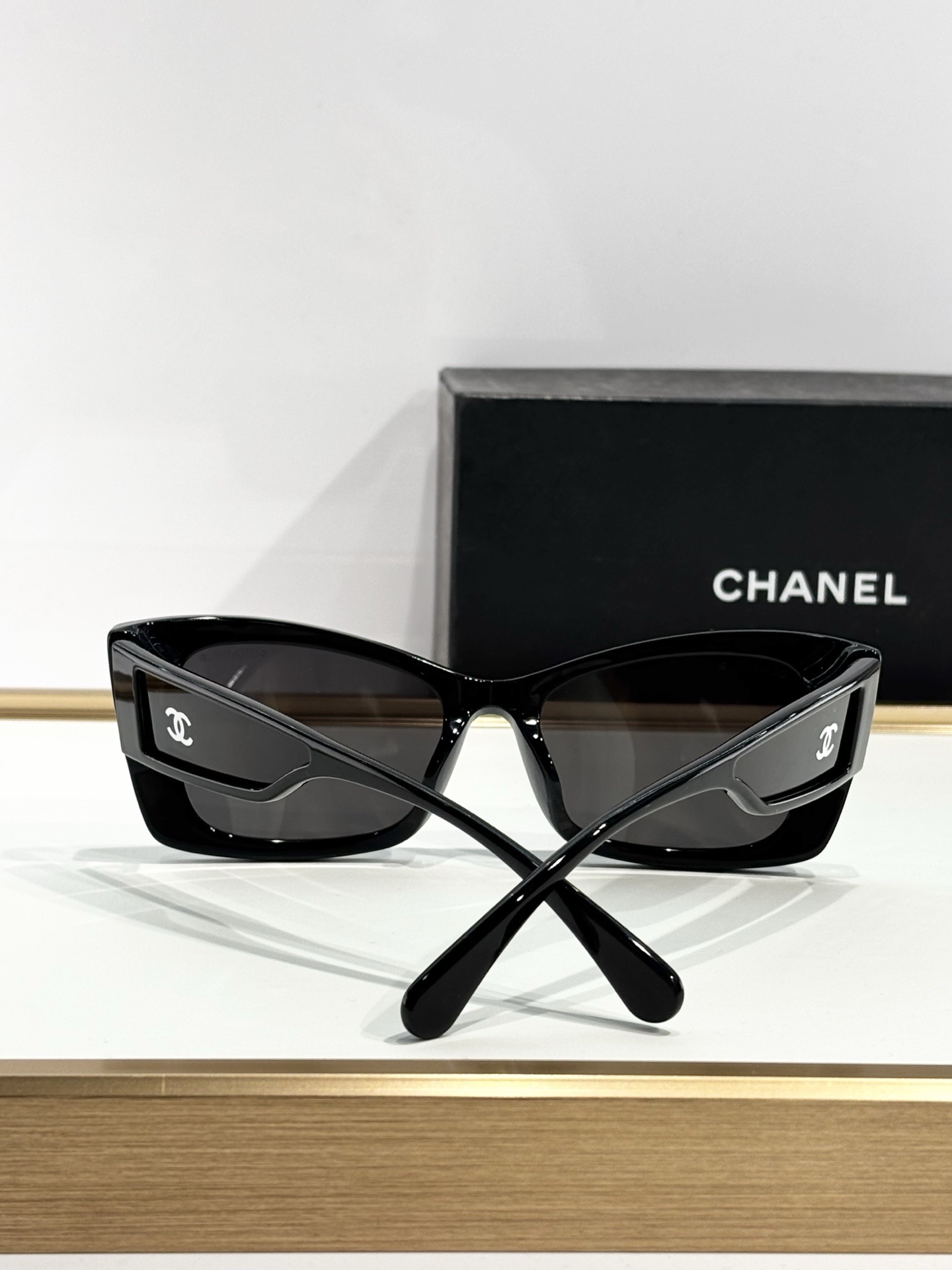 Chanel Luxury Butterfly Sunglasses – Elegant Black Frame & Tinted Lenses