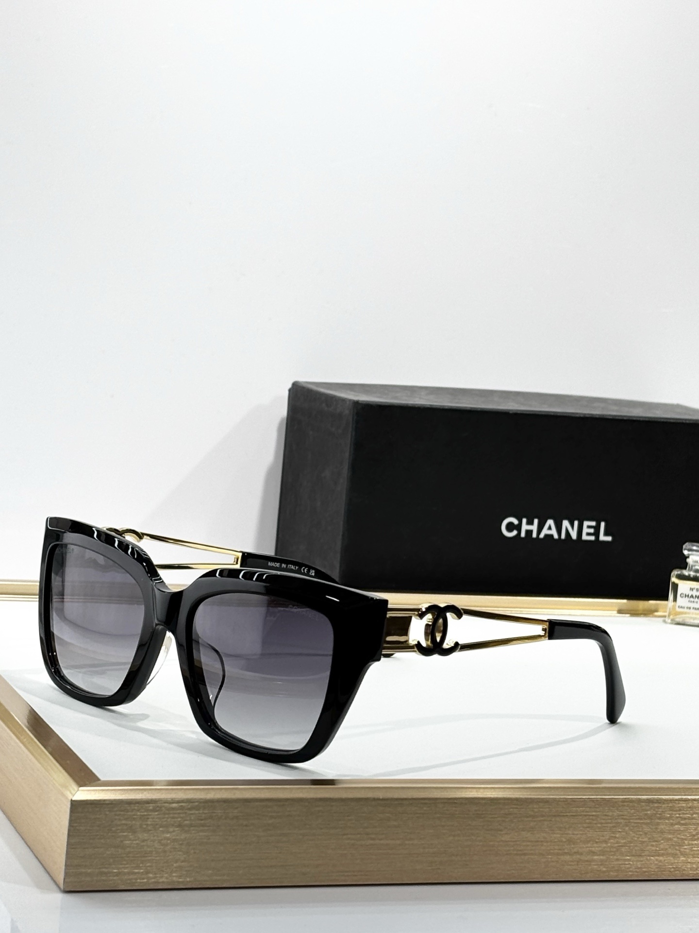Chanel Black & Gold Cat-Eye Sunglasses – Modern Glamour