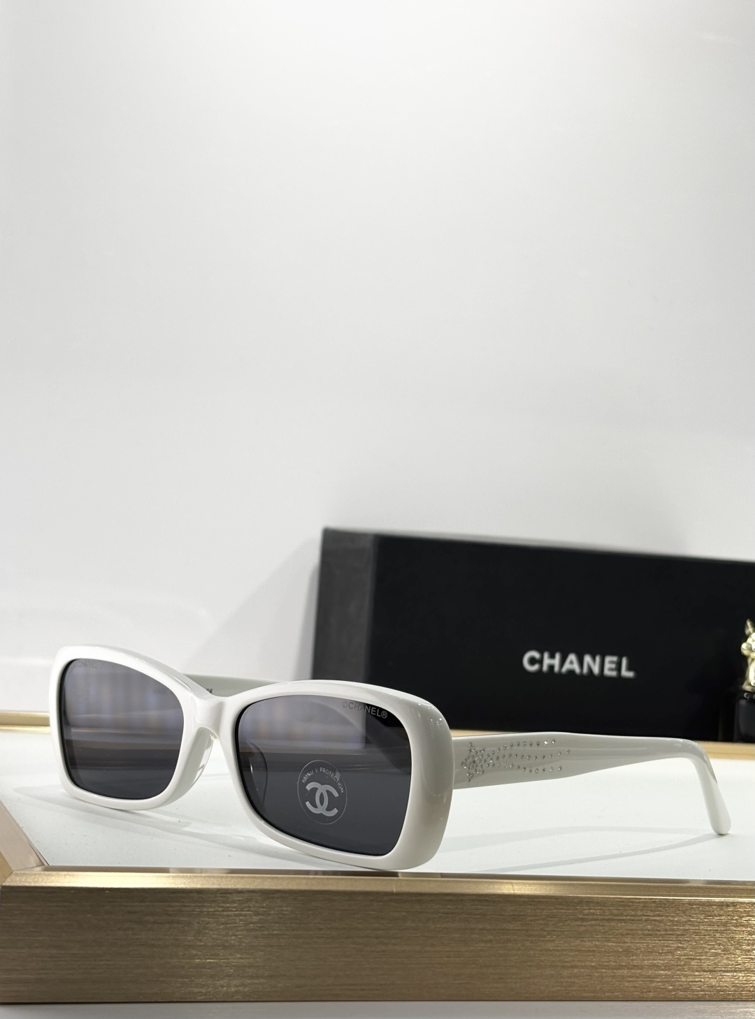 Chanel Luxury Rectangular Eyeglasses with Crystal Temple Detail