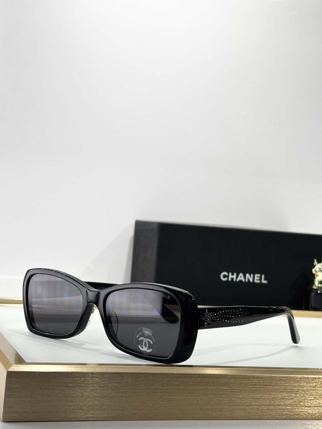 Chanel Luxury Rectangular Eyeglasses with Crystal Temple Detail