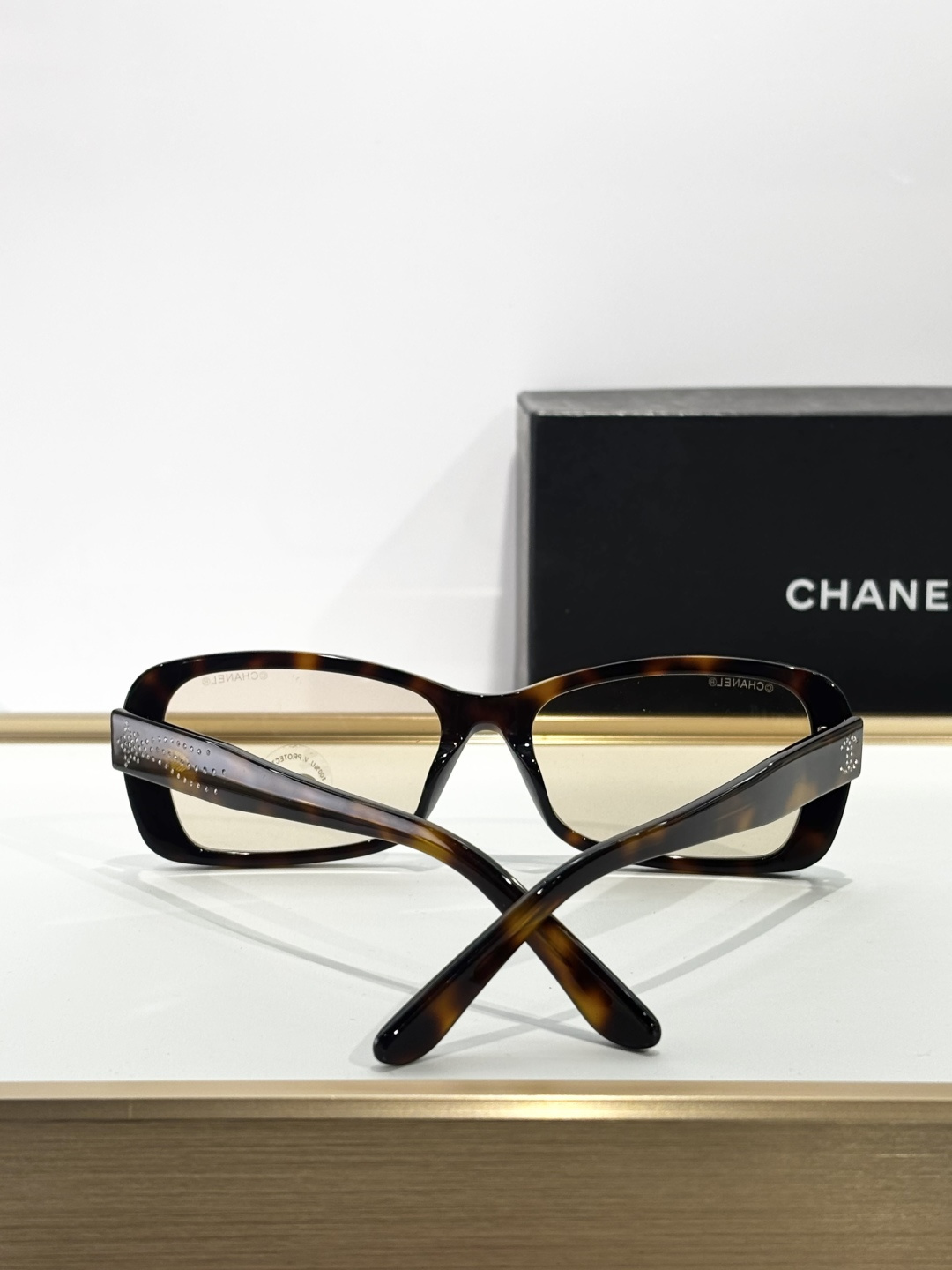 Chanel Luxury Rectangular Eyeglasses with Crystal Temple Detail