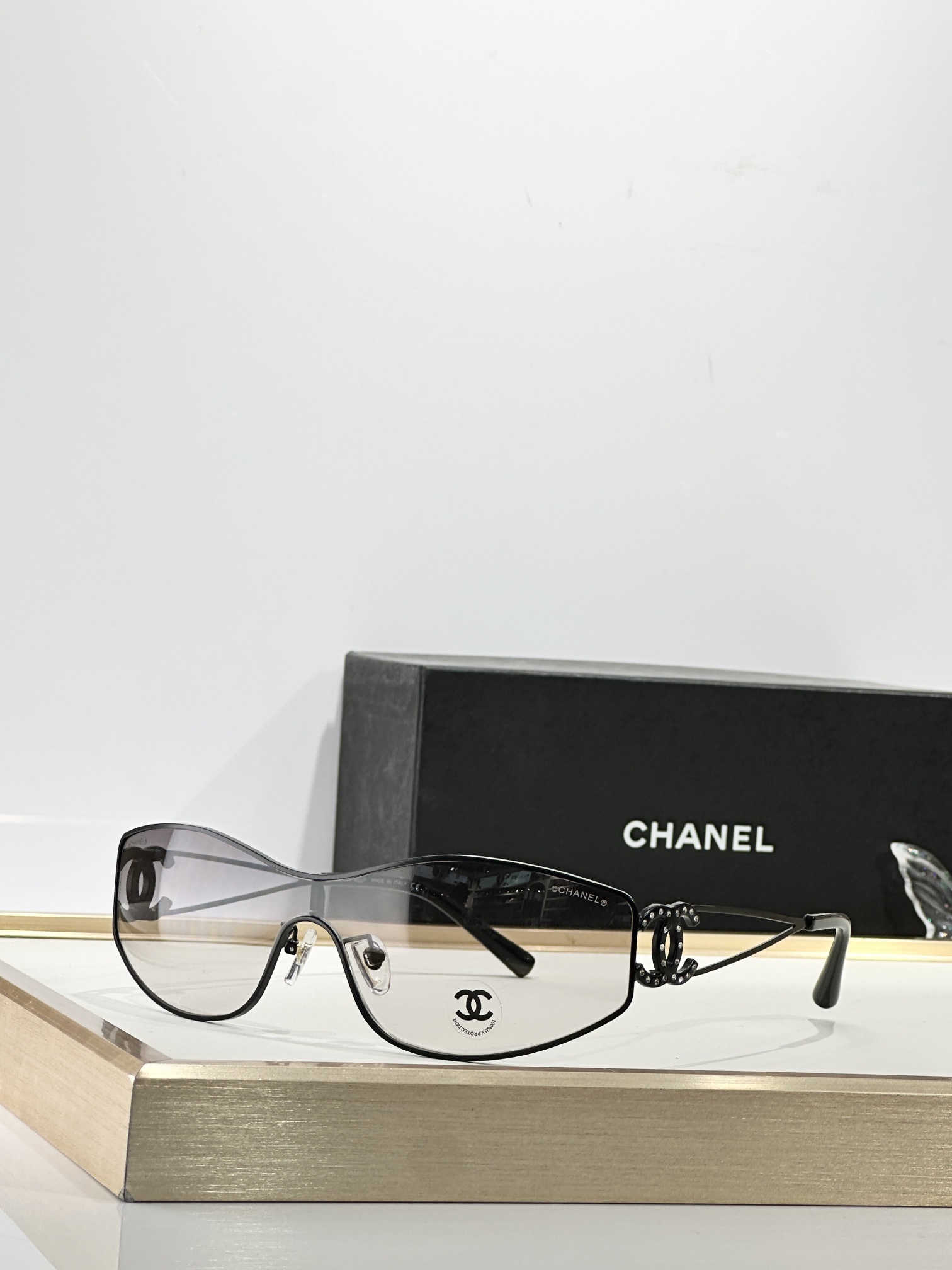 Luxury Chanel Shield Sunglasses with Crystal CC Logo – Y2K Style