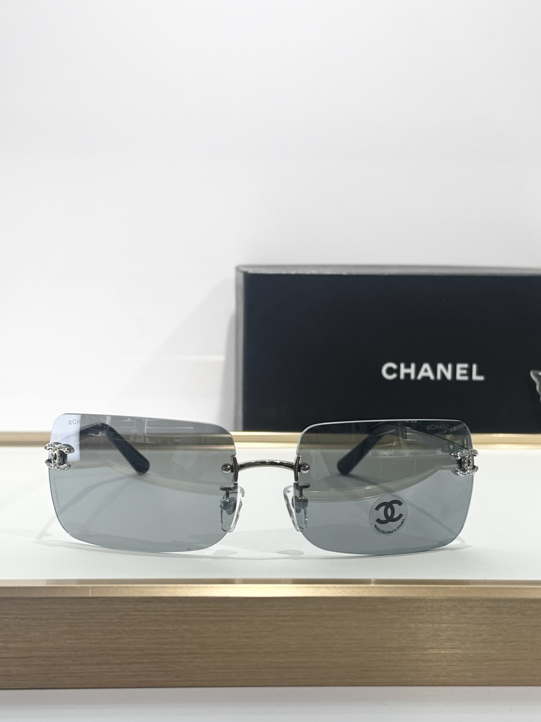 gray Chanel Silver Rimless Sunglasses – Chanel Silver Rimless