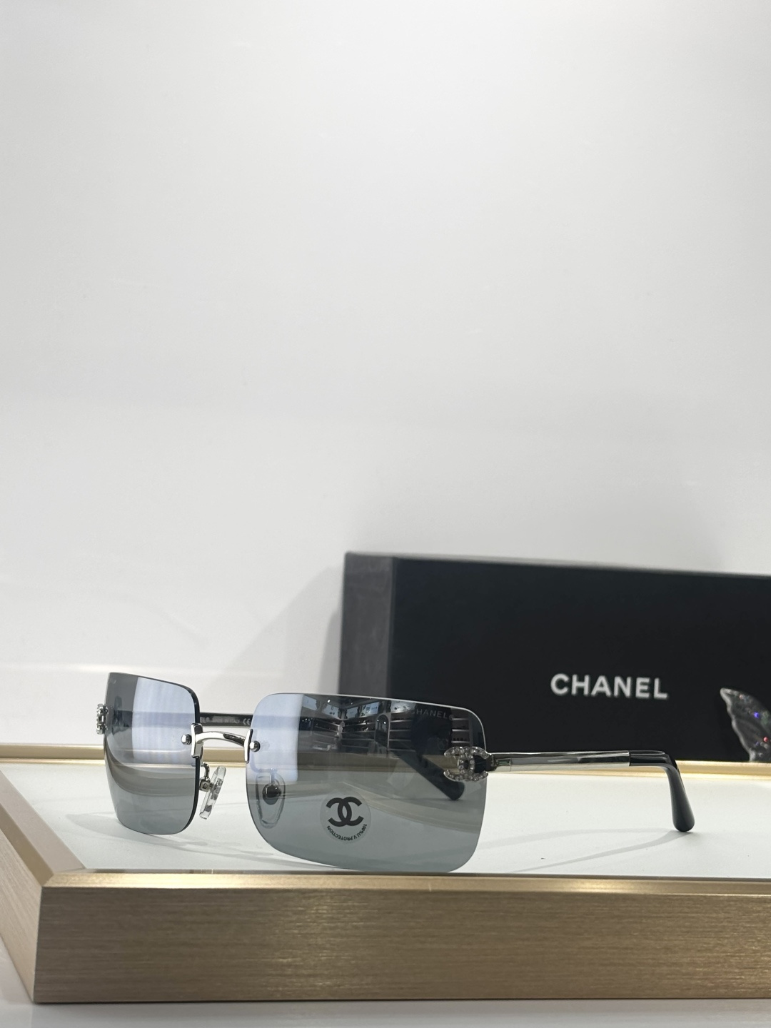 Chanel Rimless Square Sunglasses with Crystal CC Logo – Silver