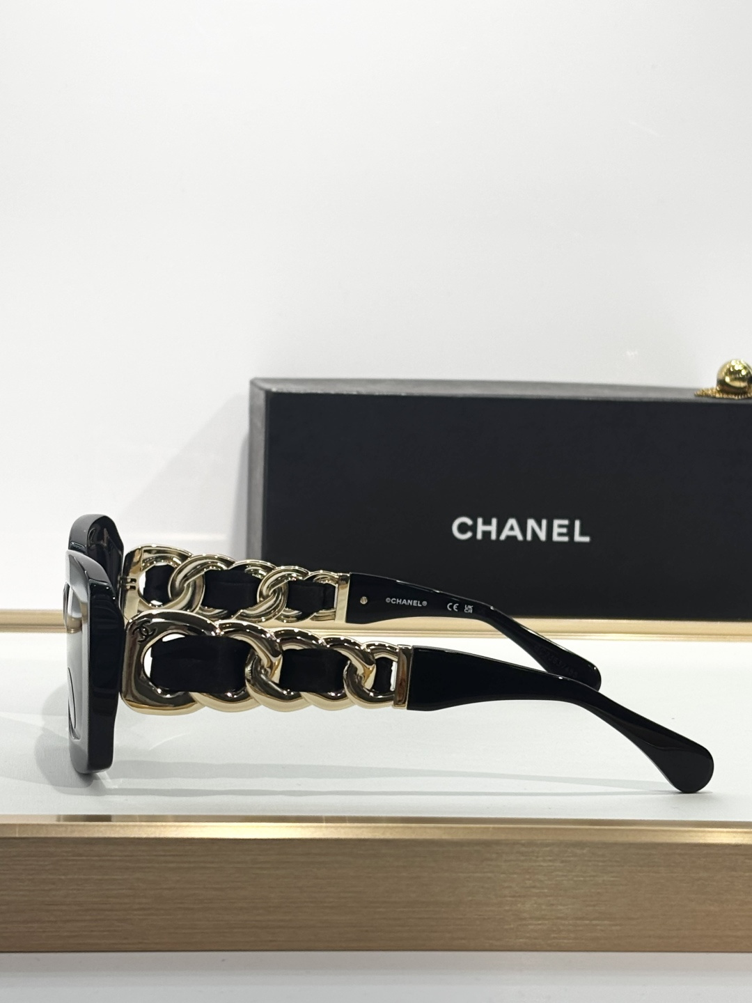 Chanel Black Rectangular Sunglasses with Gold Chain Details