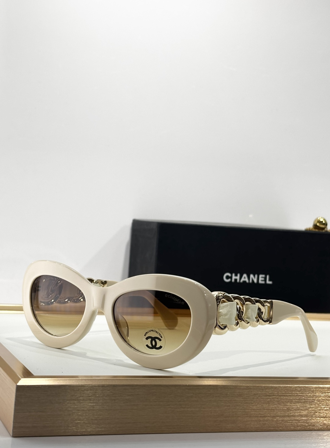 Chanel Luxury Oval Sunglasses with Gold Chain Link Arms