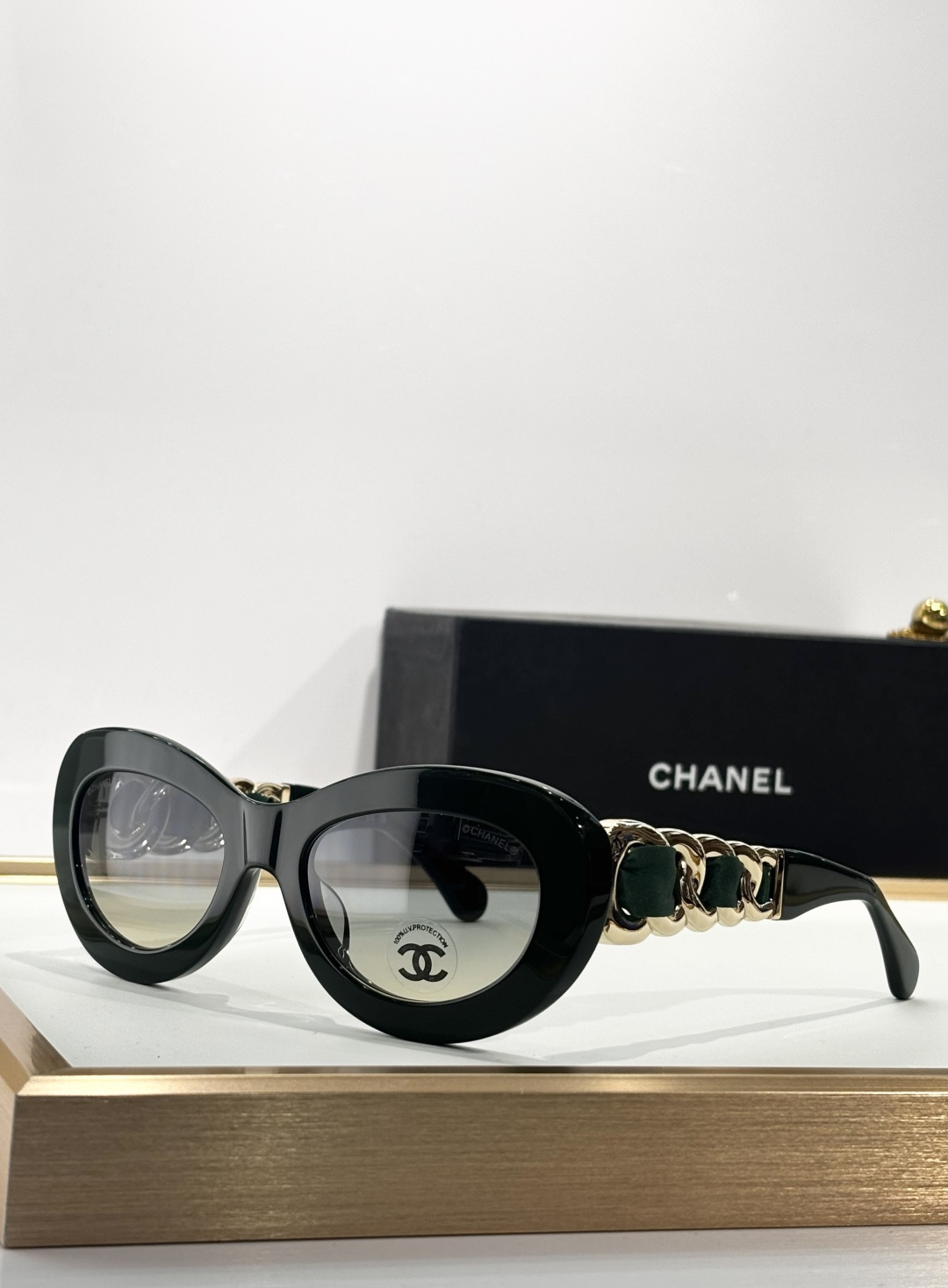 Chanel Luxury Oval Sunglasses with Gold Chain Link Arms