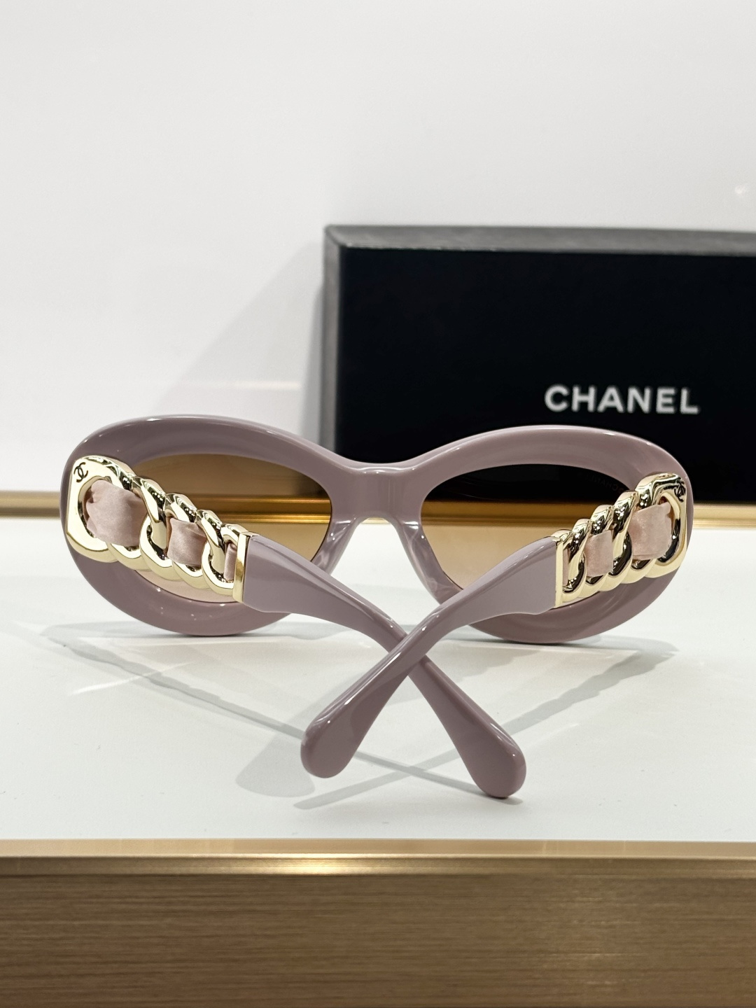 Chanel Luxury Oval Sunglasses with Gold Chain Link Arms