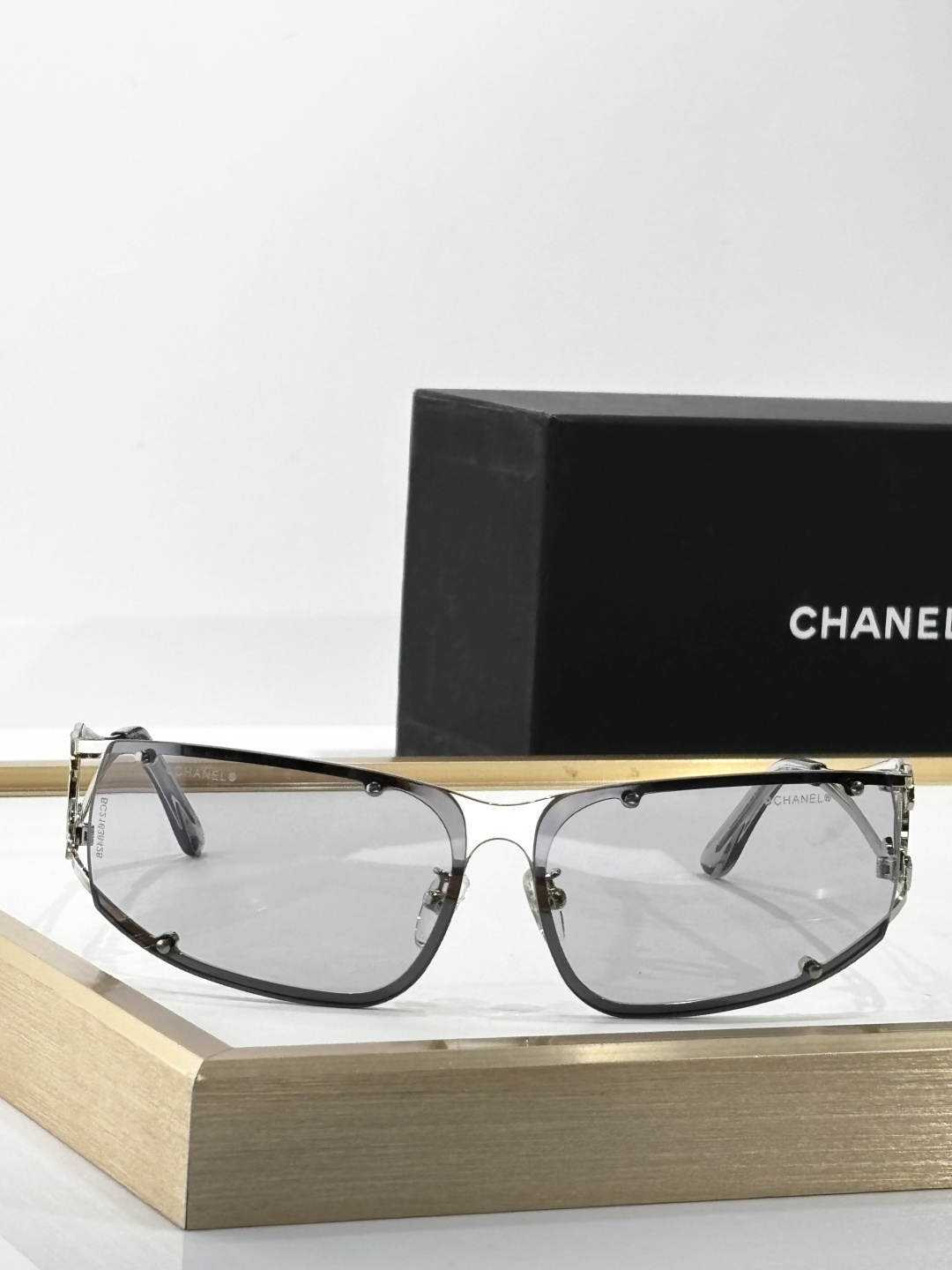 Luxury Chanel Silver Rimless Sunglasses – Iconic CC Logo Y2K Design