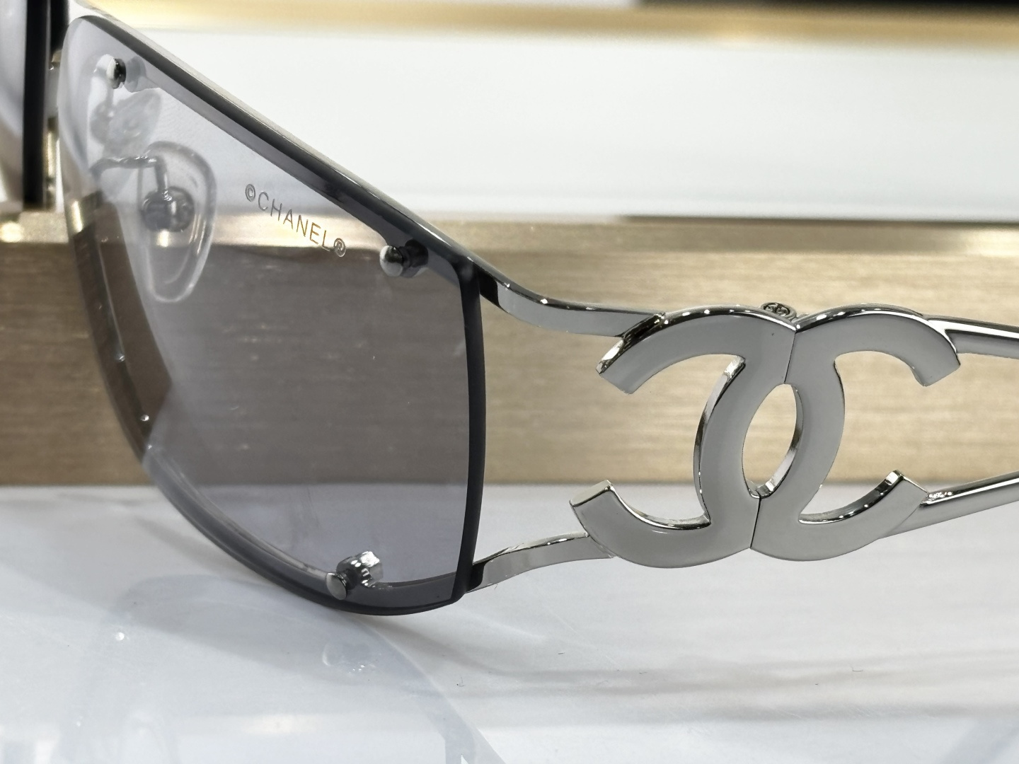 Luxury Chanel Silver Rimless Sunglasses – Iconic CC Logo Y2K Design