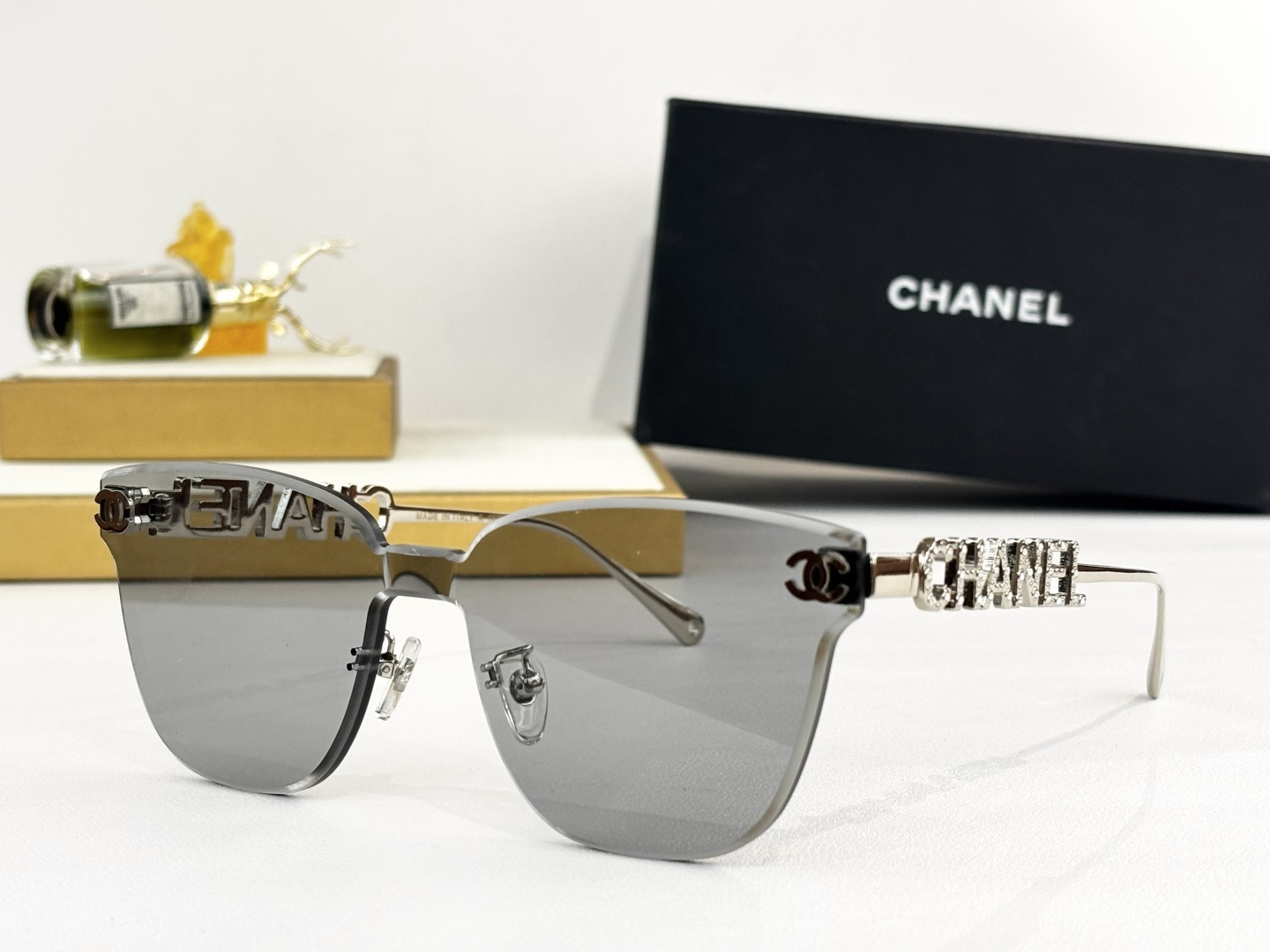 Chanel Butterfly Rimless Sunglasses – Luxury Gold Metal Logo