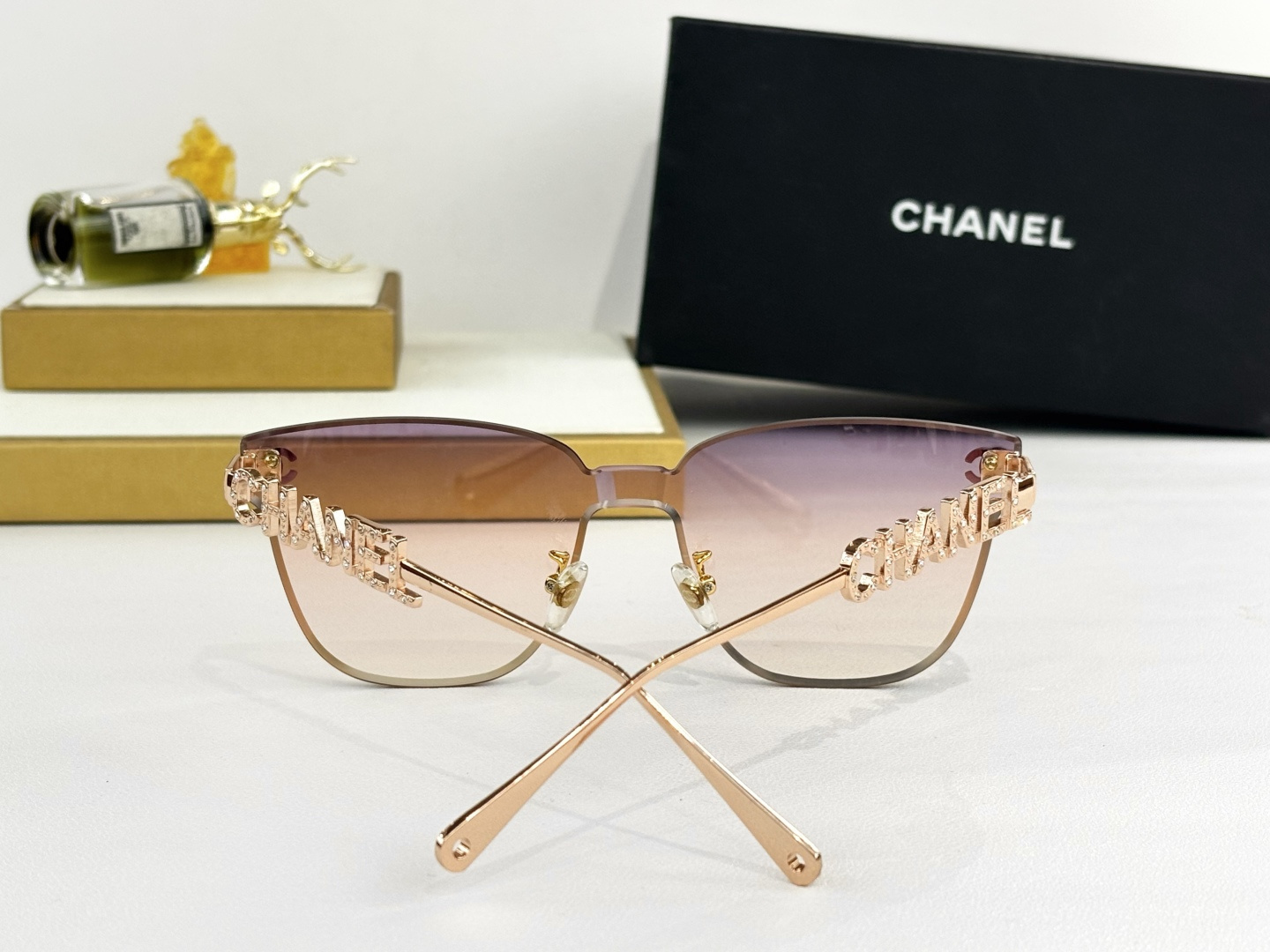 Chanel Butterfly Rimless Sunglasses – Luxury Gold Metal Logo