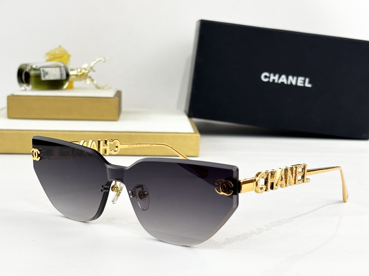 Chanel Gold Logo Sunglasses – Grey Gradient Lens