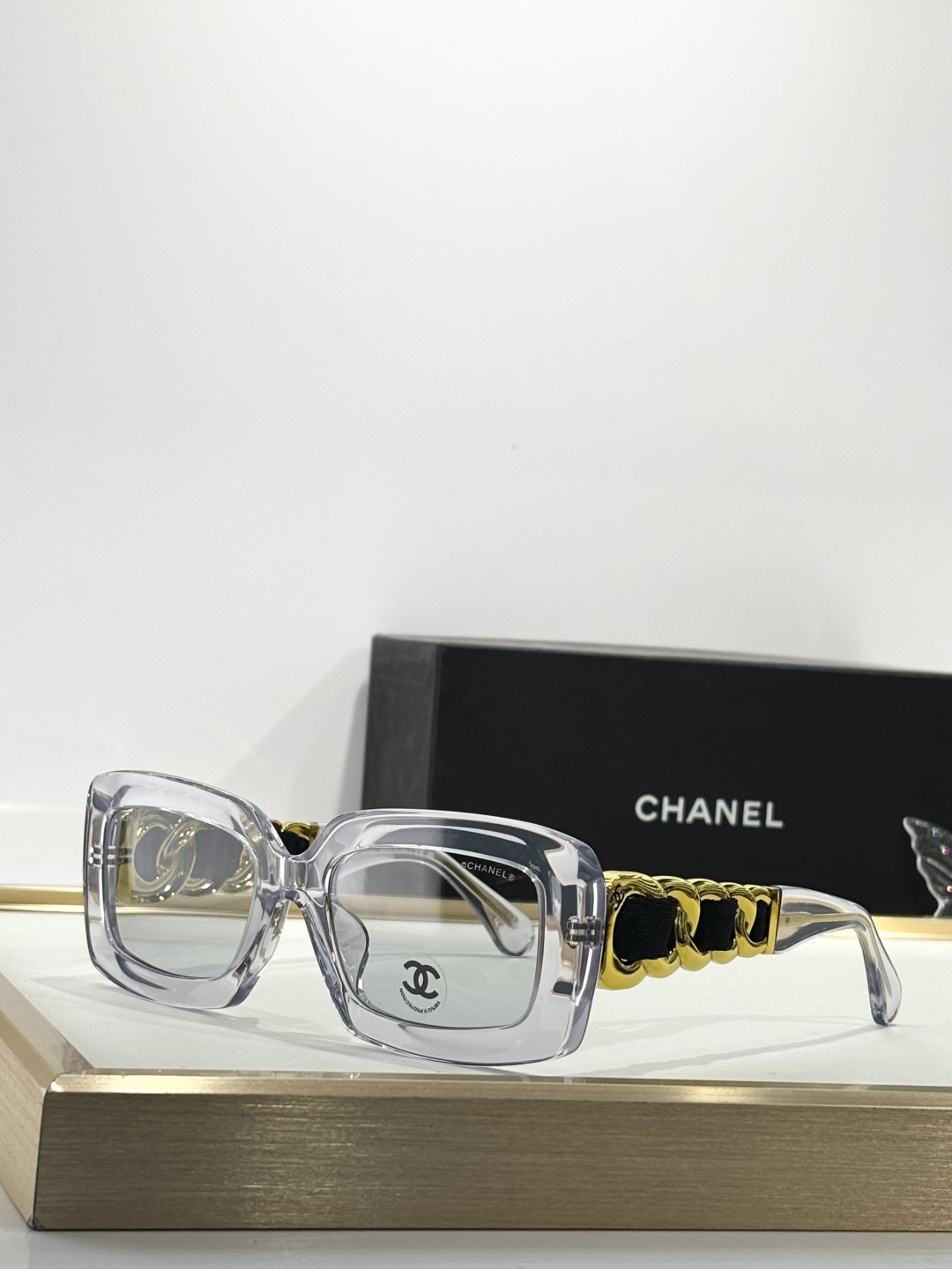 Chanel Luxury Square Sunglasses with Gold Chain Link Detail