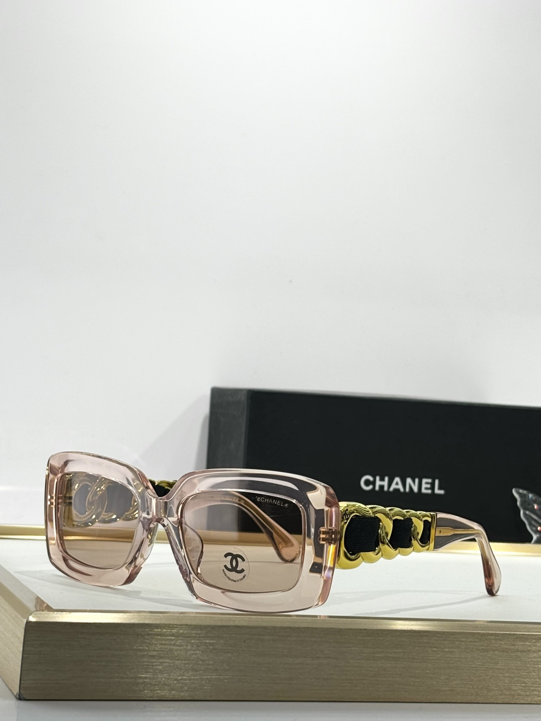 Chanel Luxury Square Sunglasses with Gold Chain Link Detail