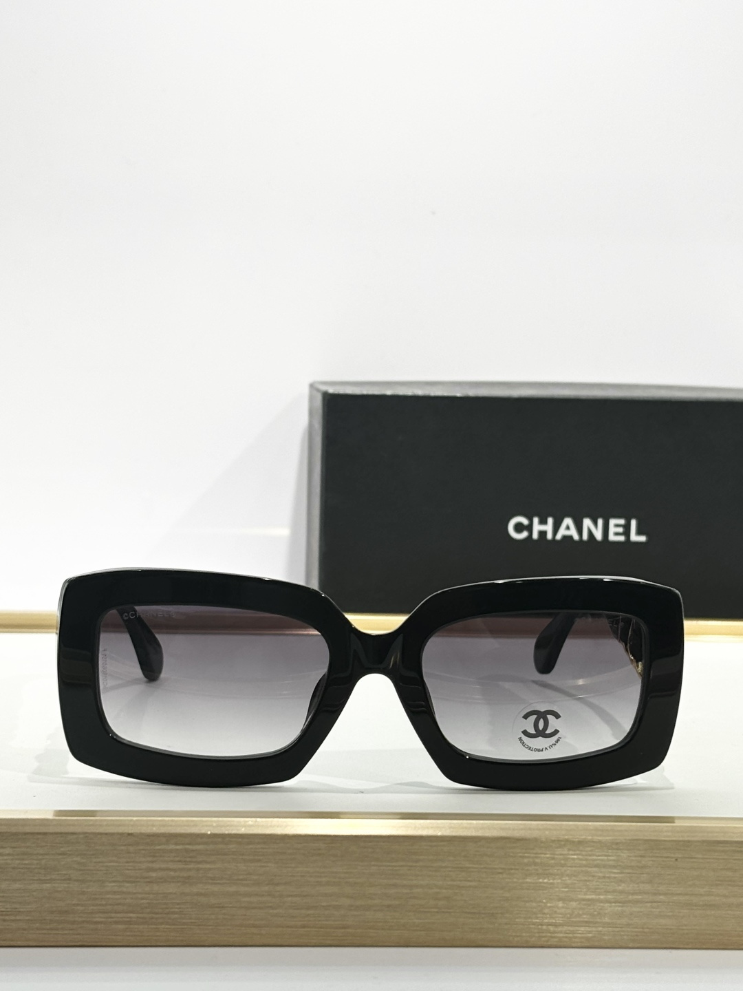 Chanel Luxury Square Sunglasses with Gold Chain Link Detail
