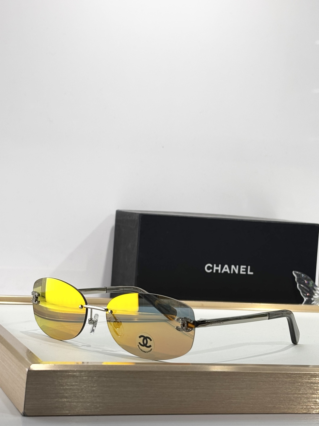 Chanel Rimless Oval Sunglasses with Rhinestone CC Logo
