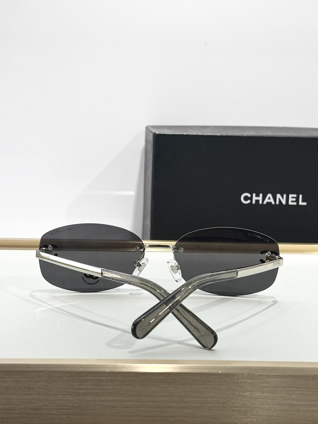 Chanel Rimless Oval Sunglasses with Rhinestone CC Logo