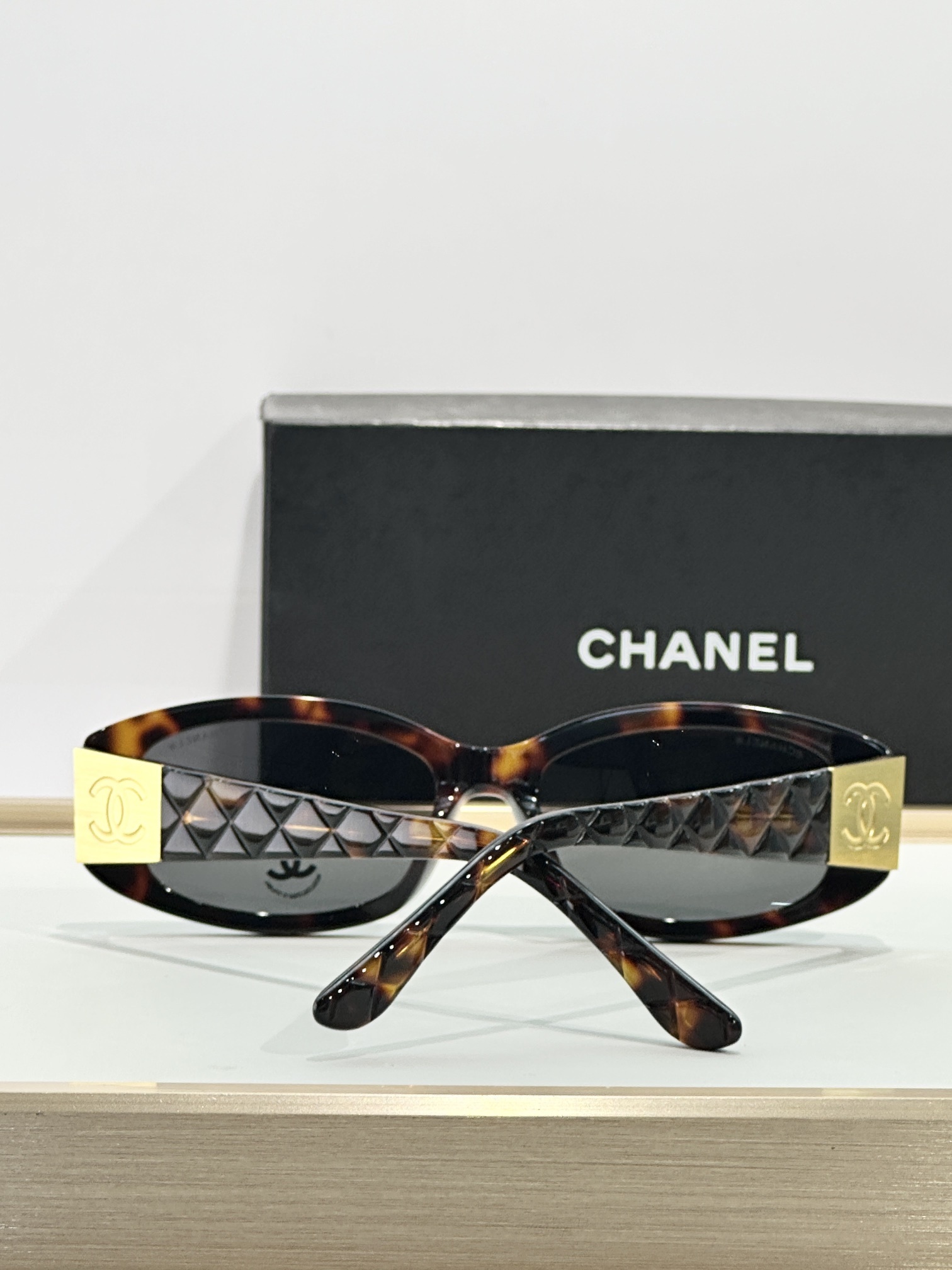 Chanel Quilted Rectangular Sunglasses with Gold CC Logo – Black