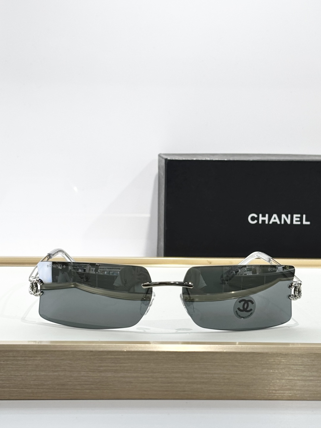 Chanel Rimless Rectangular Silver Sunglasses with Rhinestone CC Logo