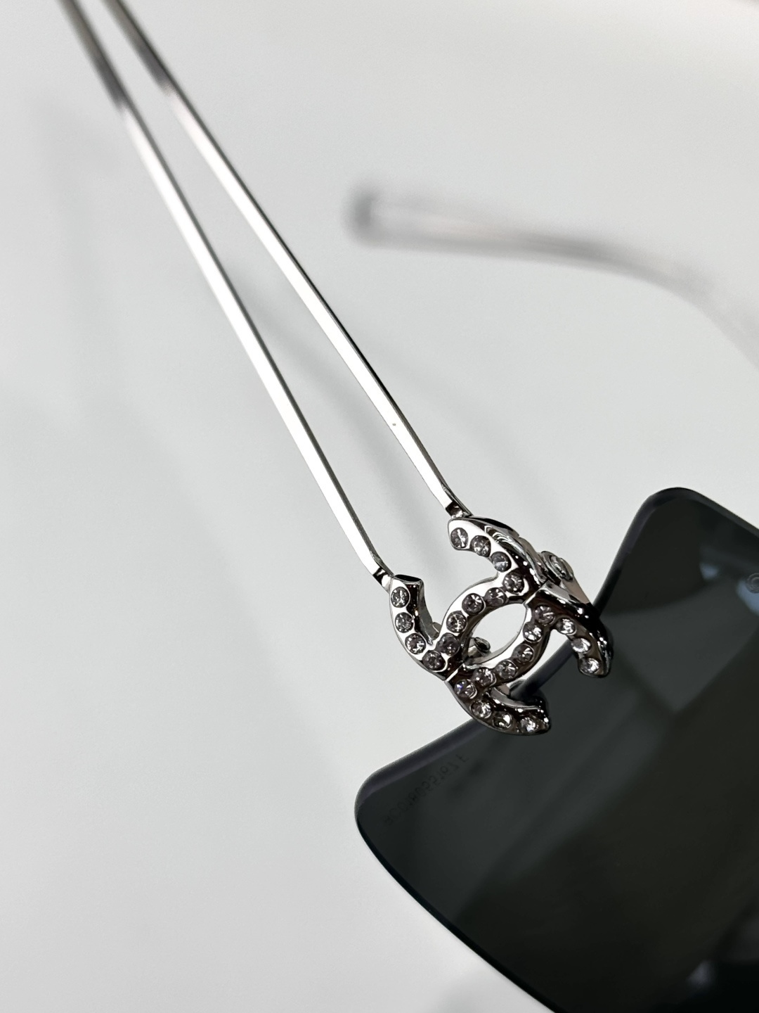 Chanel Rimless Rectangular Silver Sunglasses with Rhinestone CC Logo