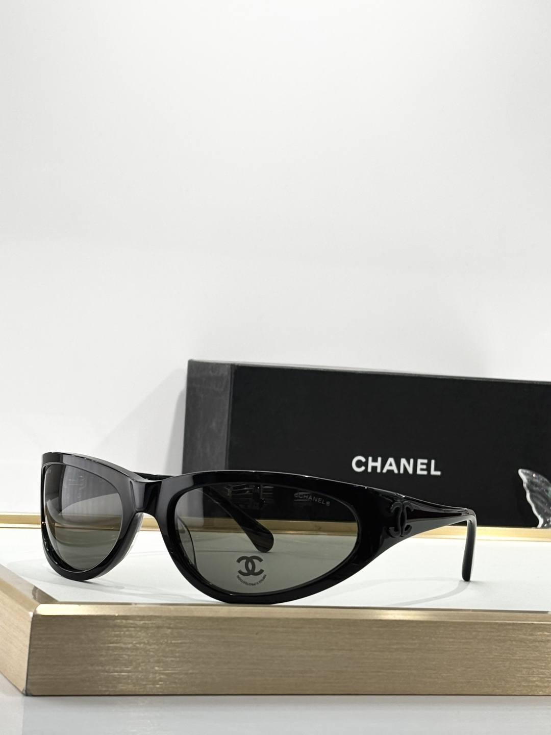 Chanel Wrap-Around Sunglasses – Black Frame, Gray Lens