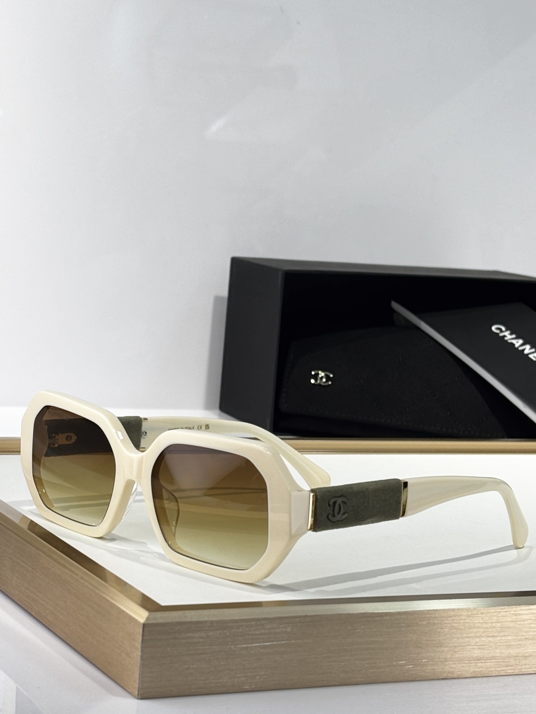 Chanel Luxury Cream Square Sunglasses with Suede Logo Temples