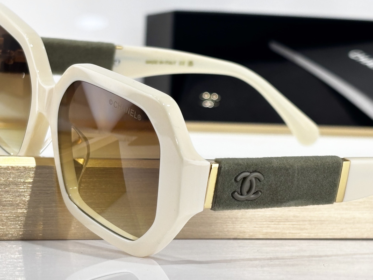 Chanel Luxury Cream Square Sunglasses with Suede Logo Temples