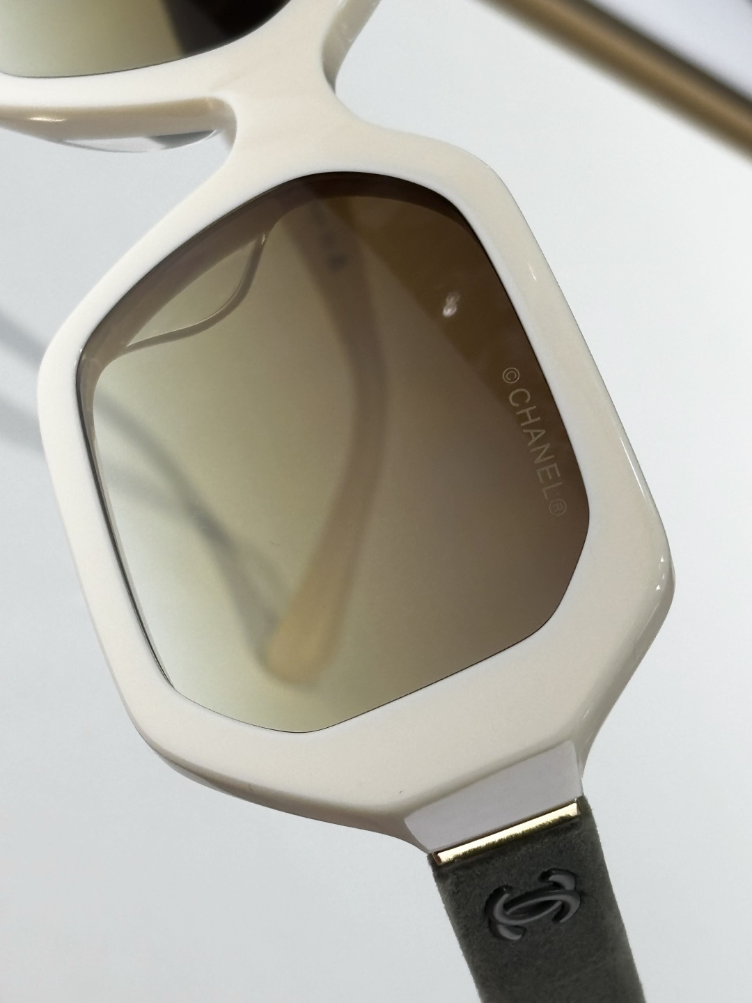 Chanel Luxury Cream Square Sunglasses with Suede Logo Temples