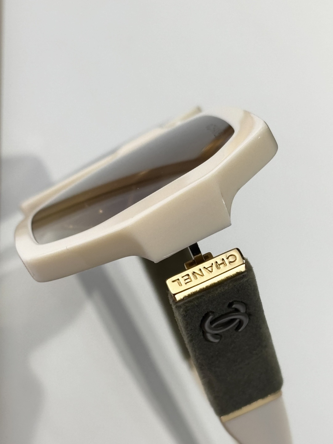 Chanel Luxury Cream Square Sunglasses with Suede Logo Temples