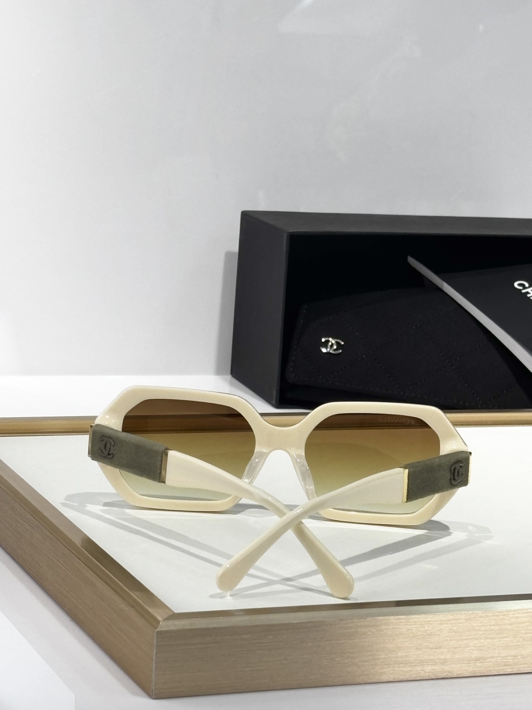 Chanel Luxury Cream Square Sunglasses with Suede Logo Temples