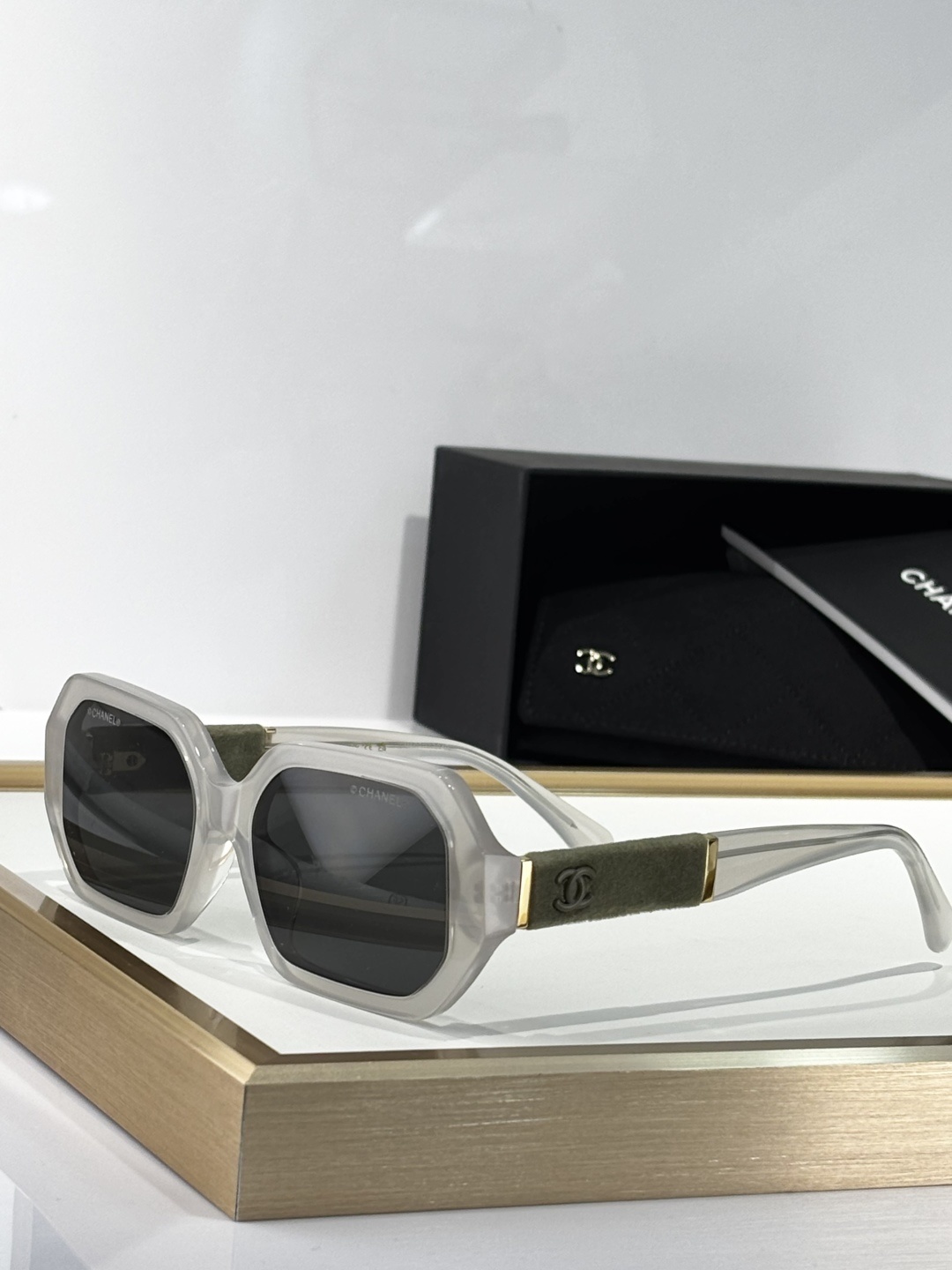 Chanel Luxury Translucent Grey Sunglasses with Velvet Temple Detail