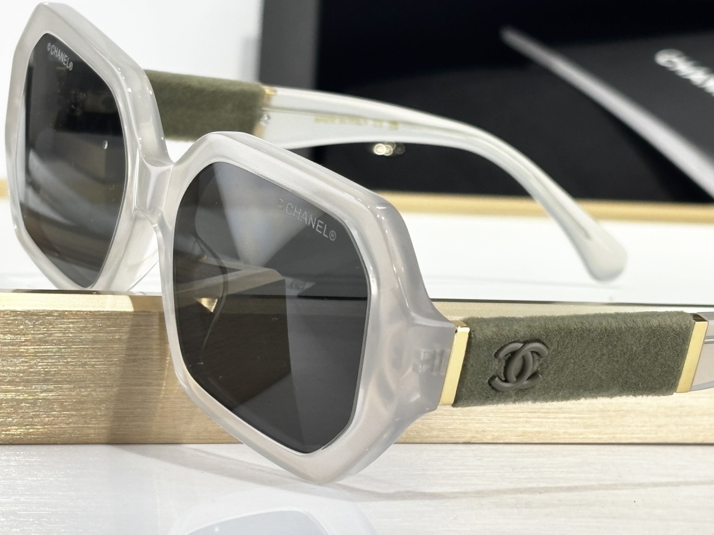 Chanel Luxury Translucent Grey Sunglasses with Velvet Temple Detail
