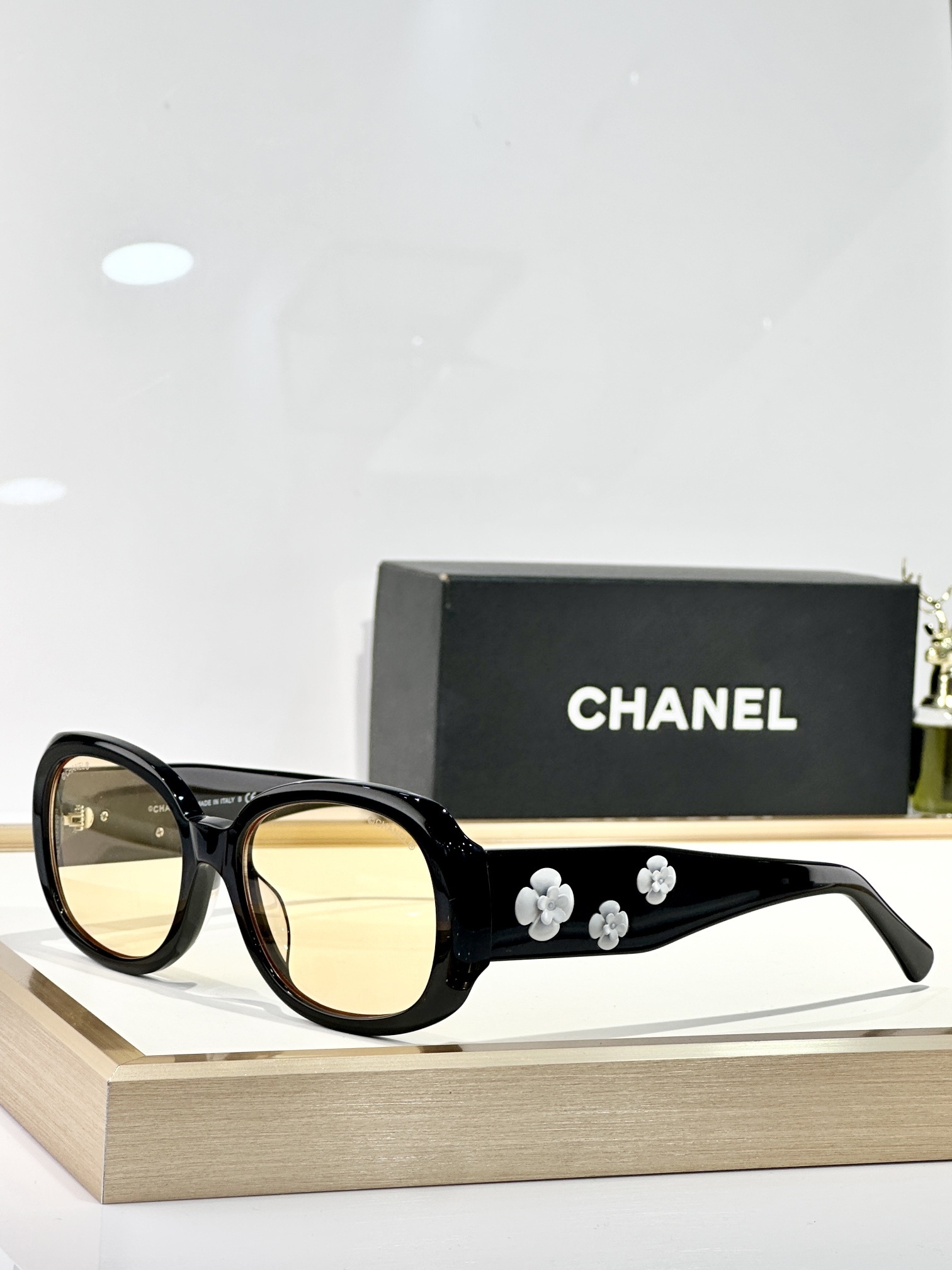 Chanel Black Floral Accent Sunglasses – Amber Lens