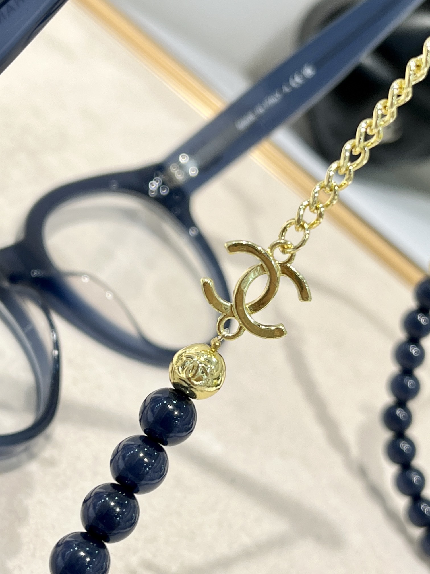 Chanel Designer Round Eyeglasses with Beaded Chain Accessory