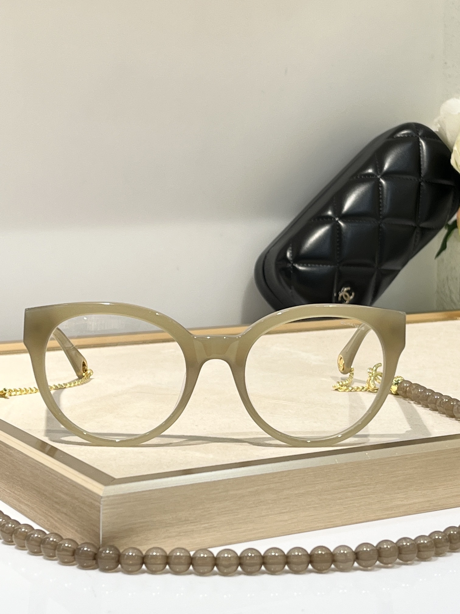 Chanel Luxury Cat-Eye Eyeglasses with Elegant Beaded Chain