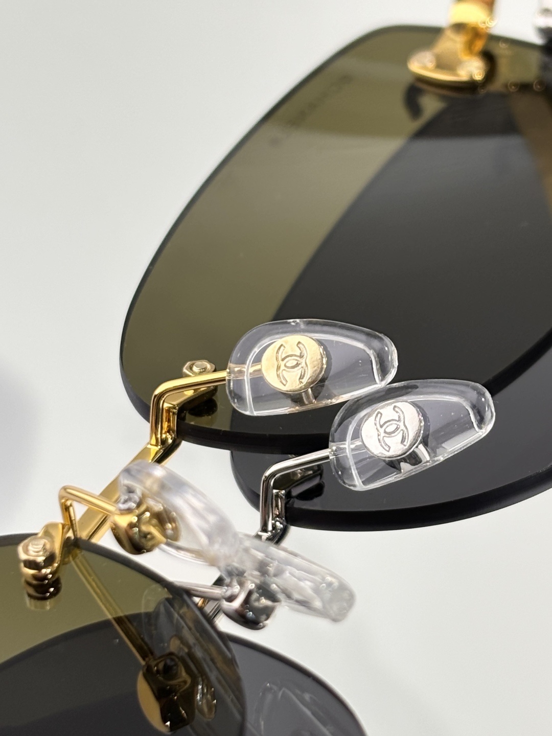 Chanel Luxury Rimless Sunglasses – Elegant Oval CC Logo Eyewear