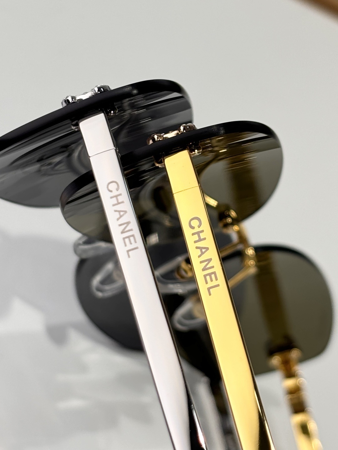 Chanel Luxury Rimless Sunglasses – Elegant Oval CC Logo Eyewear