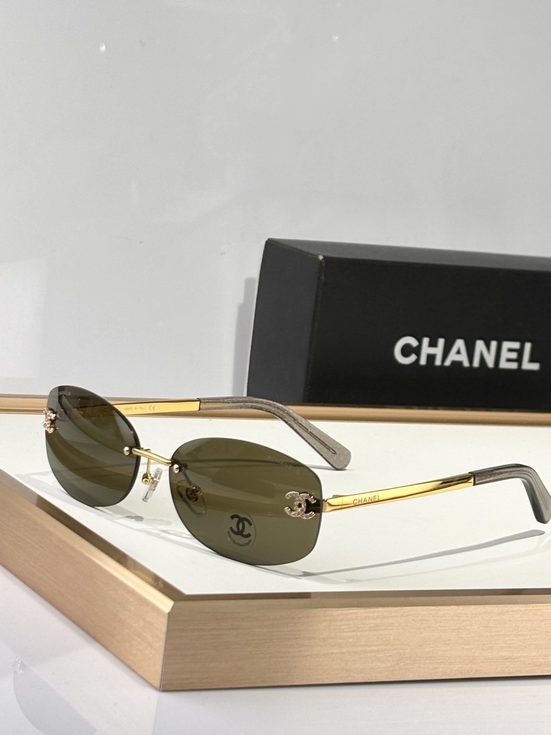 Chanel Luxury Rimless Oval Sunglasses with Rhinestone CC Logo