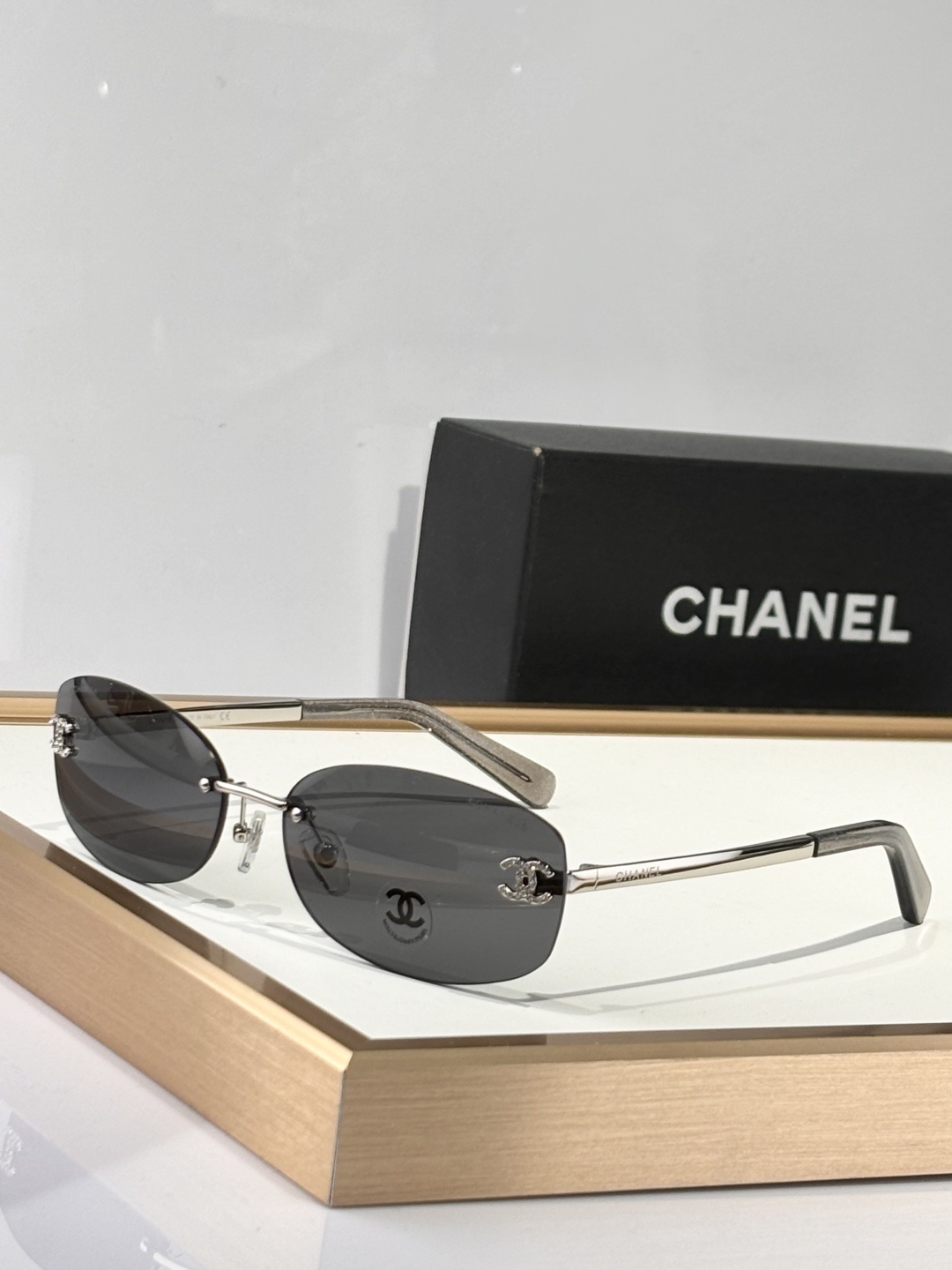 Chanel Luxury Rimless Oval Sunglasses with Rhinestone CC Logo