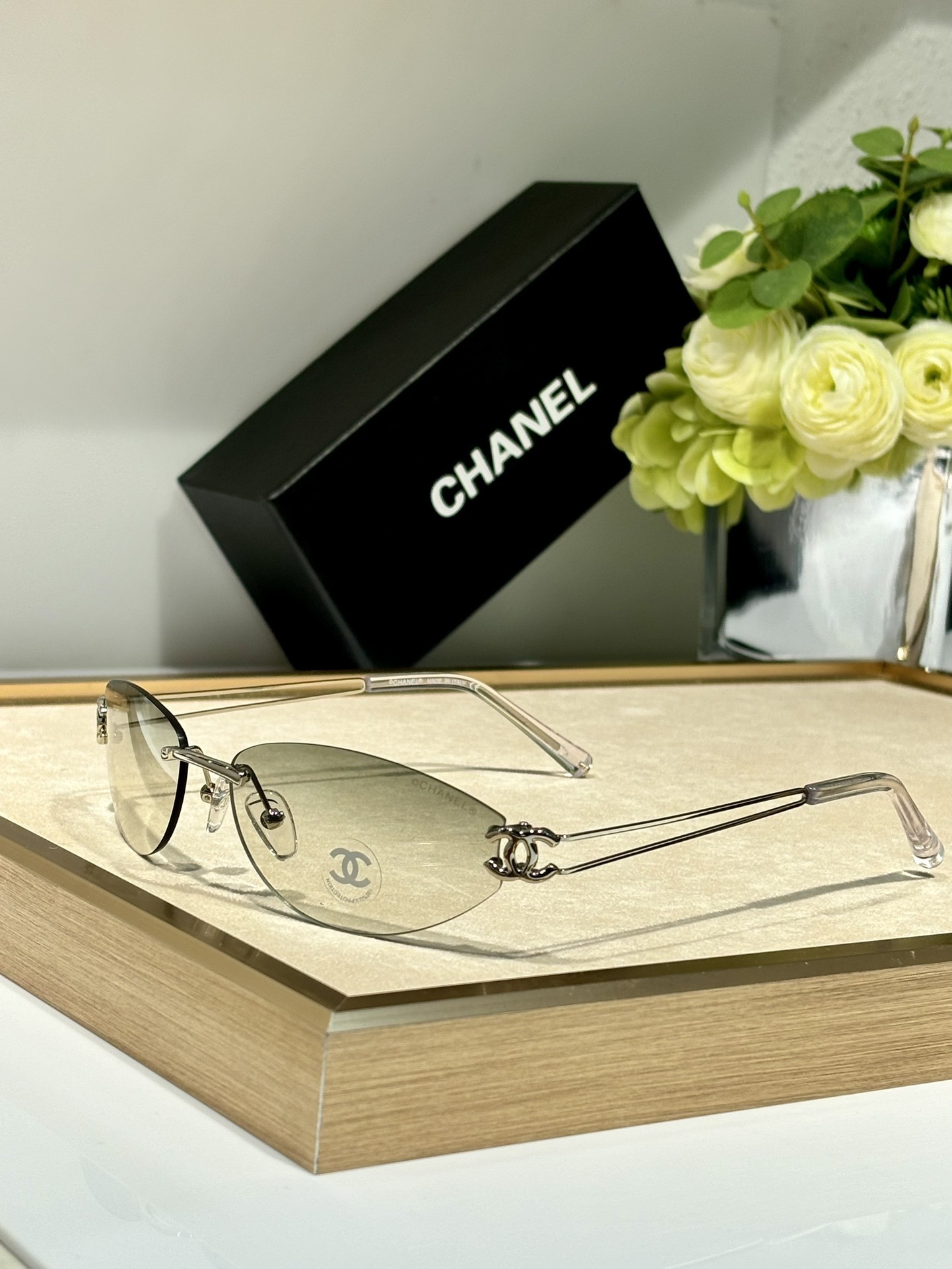 Chanel Luxury Rimless Oval Sunglasses with CC Logo Metal Frame