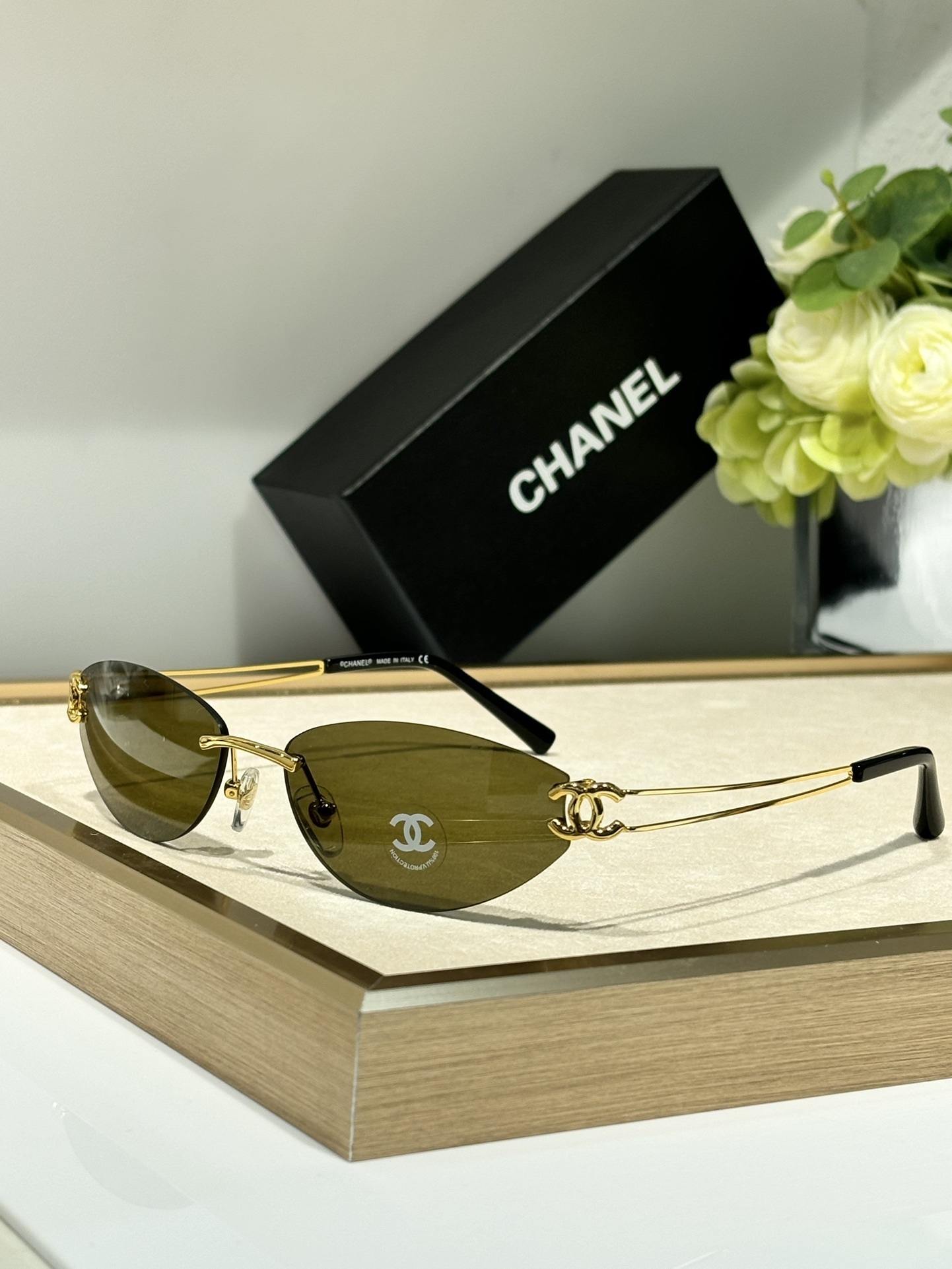 Chanel Luxury Rimless Oval Sunglasses with CC Logo Metal Frame
