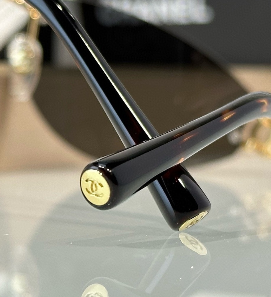 Chanel Luxury Rimless Oval Sunglasses with CC Logo Metal Frame