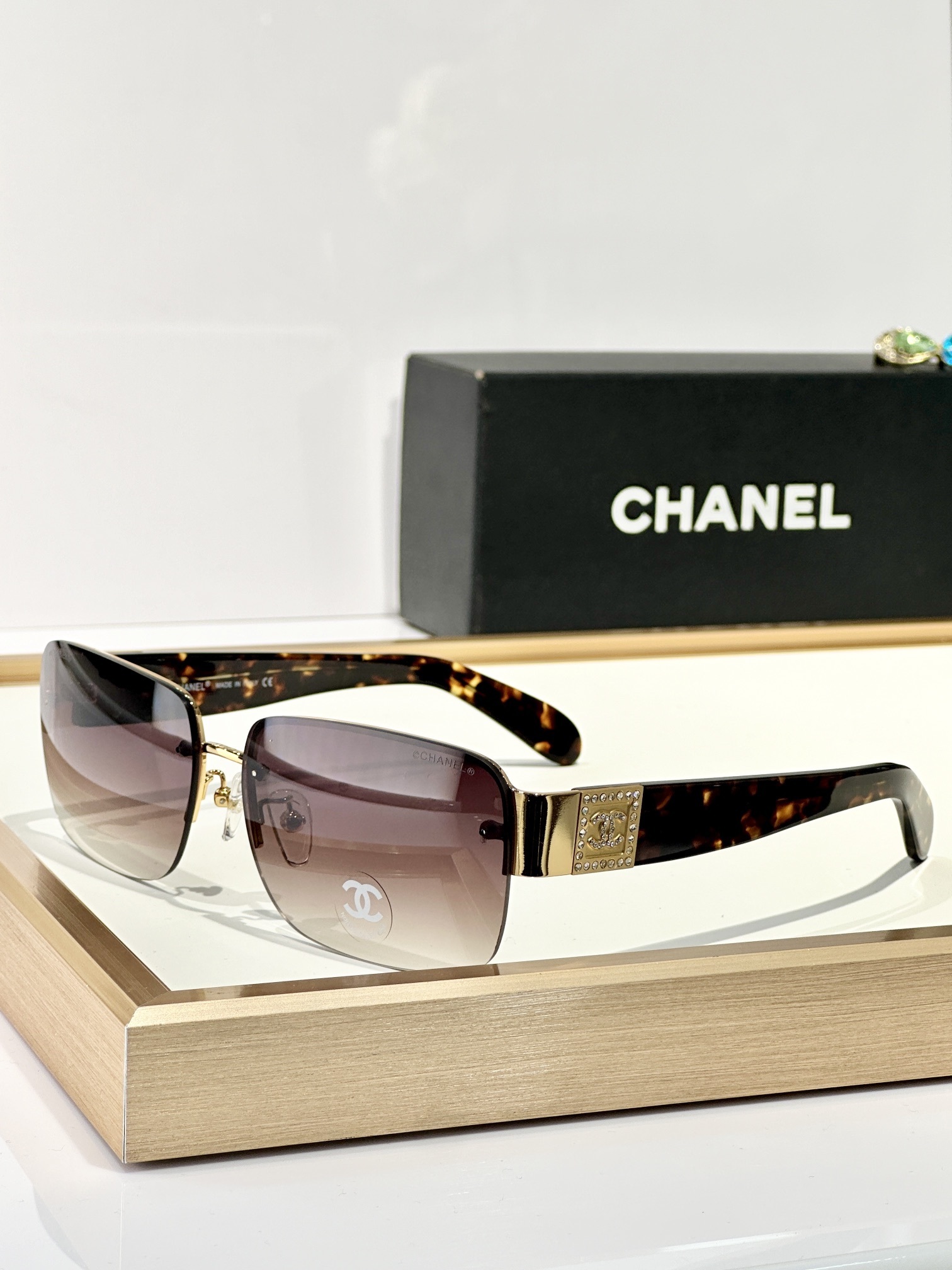 Chanel Rimless Rectangle Sunglasses with Crystal CC Logo