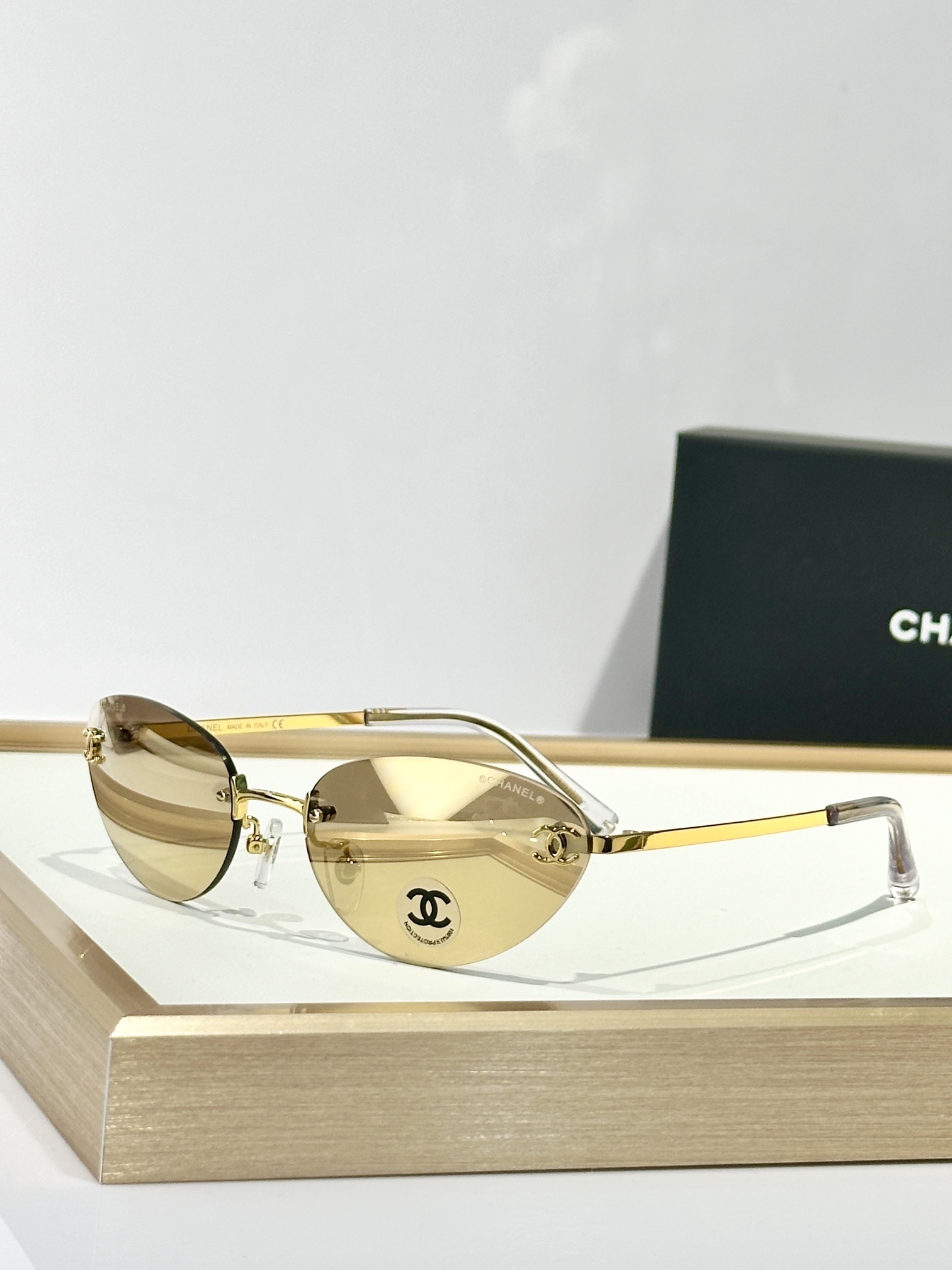 gold Chanel Rimless Oval Sunglasses – Chanel Rimless Oval Sunglasses