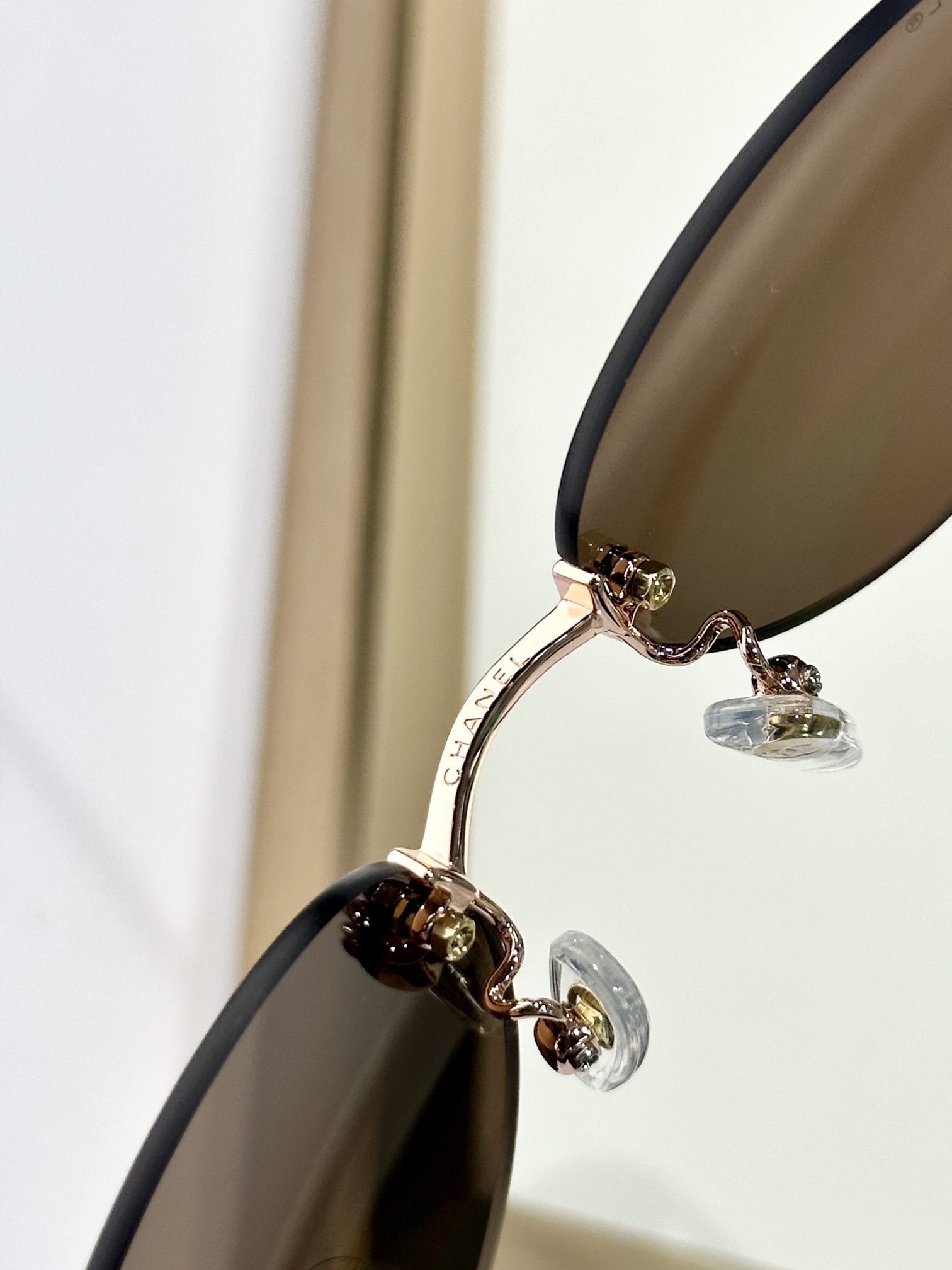 Chanel Luxury Rimless Oval Sunglasses – Vintage Cat-Eye Eyewear